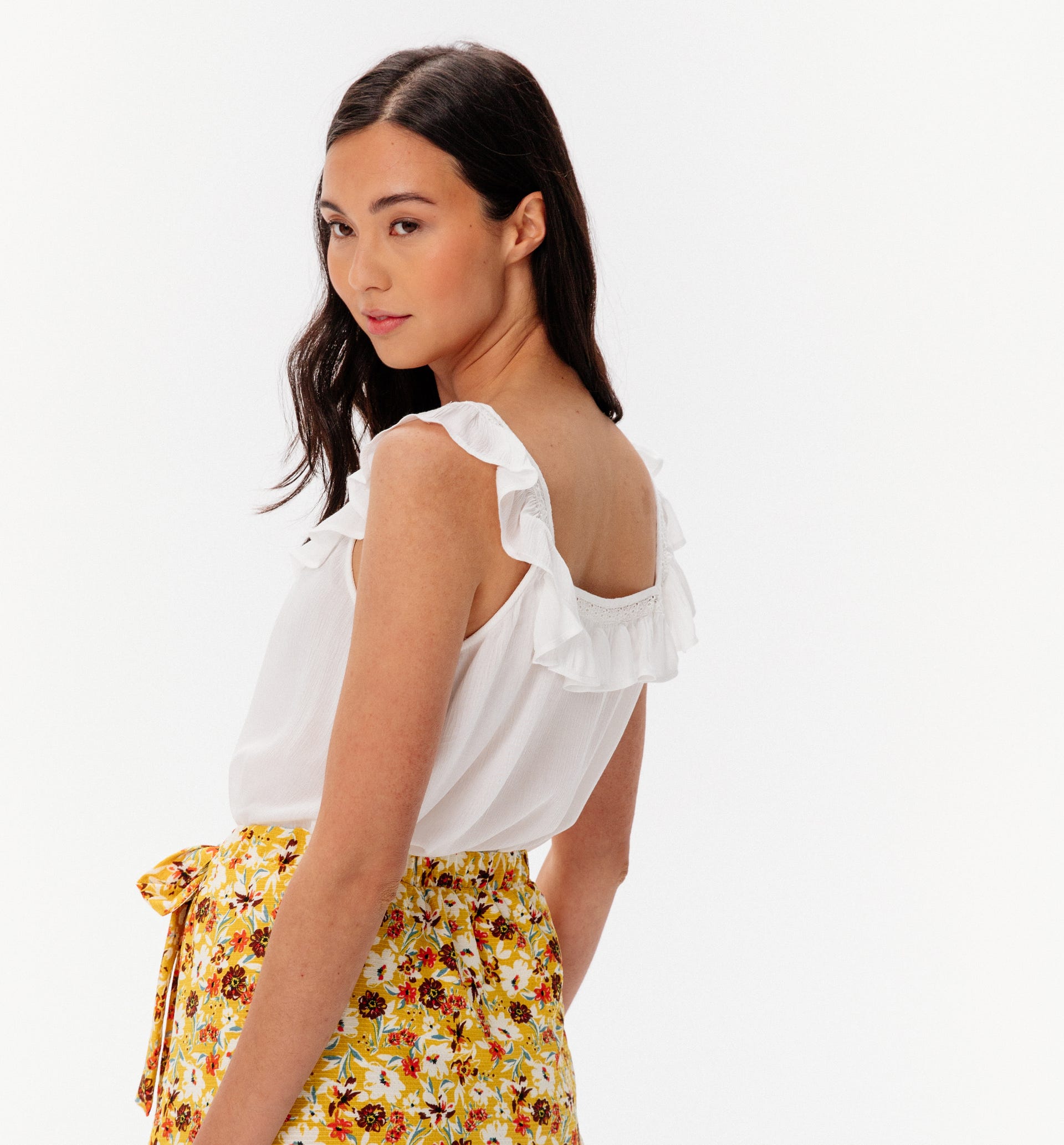 Top with frilly neckline