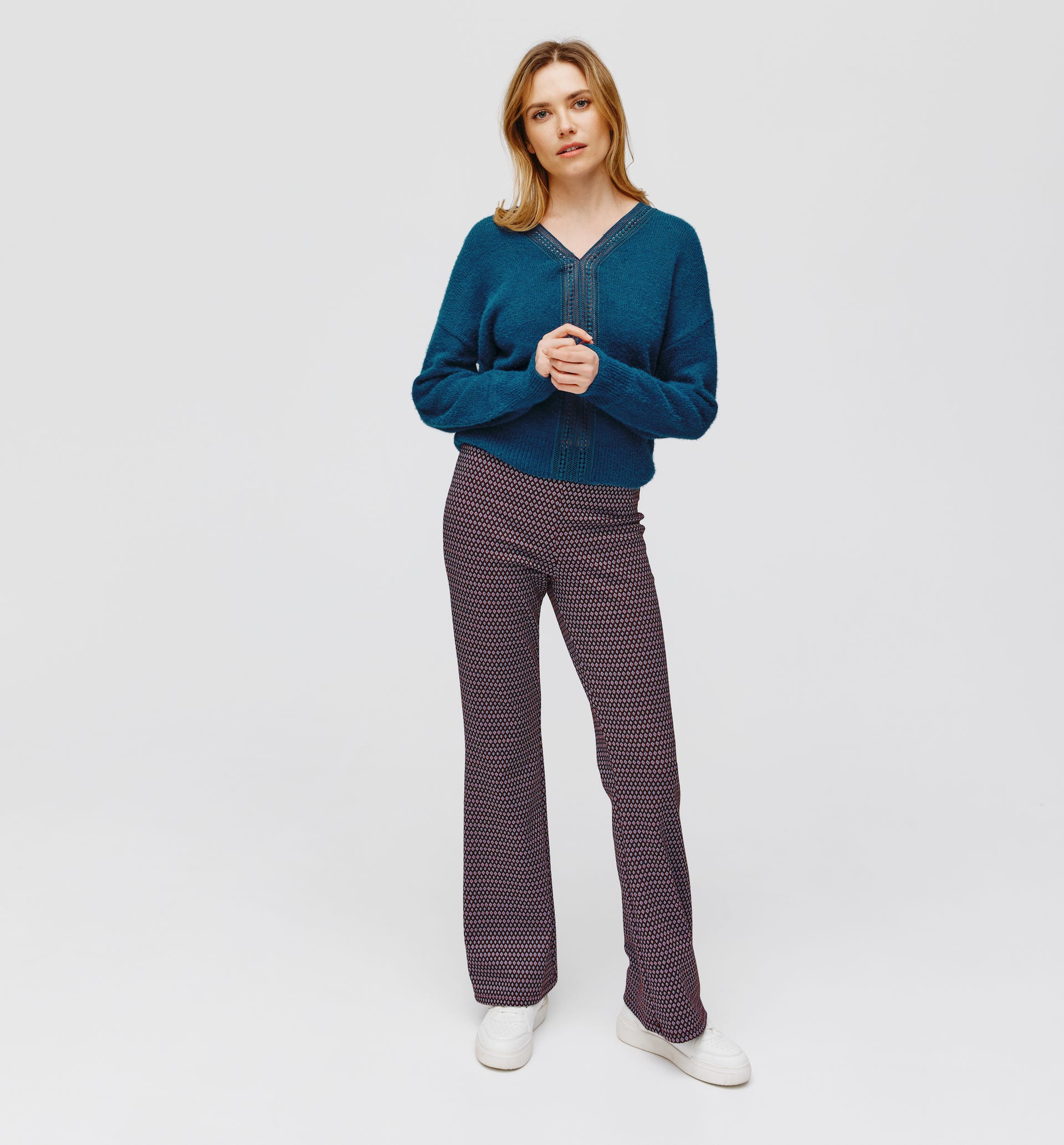 Pull moelleux détail crochet