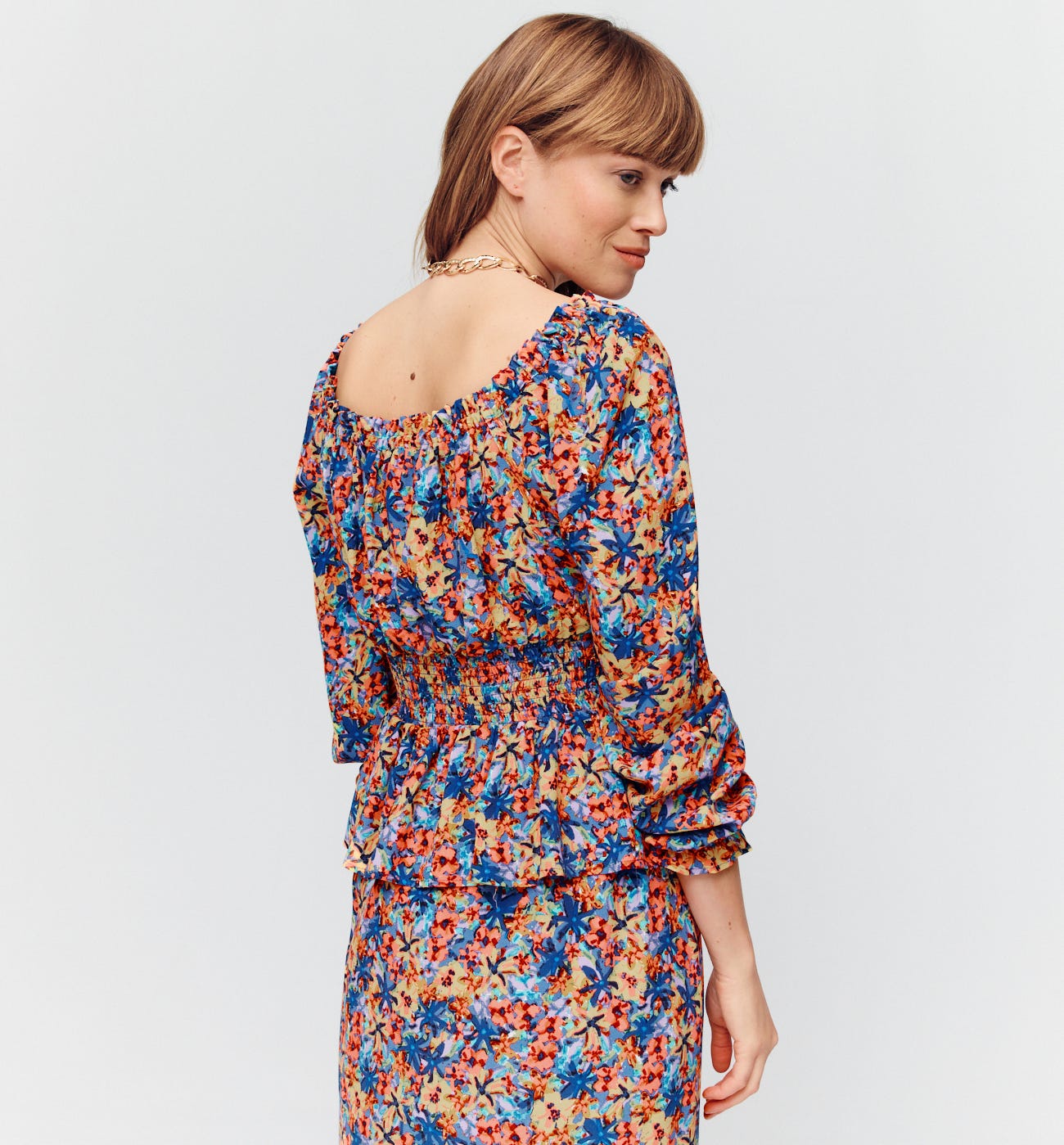 Patterned smocked blouse