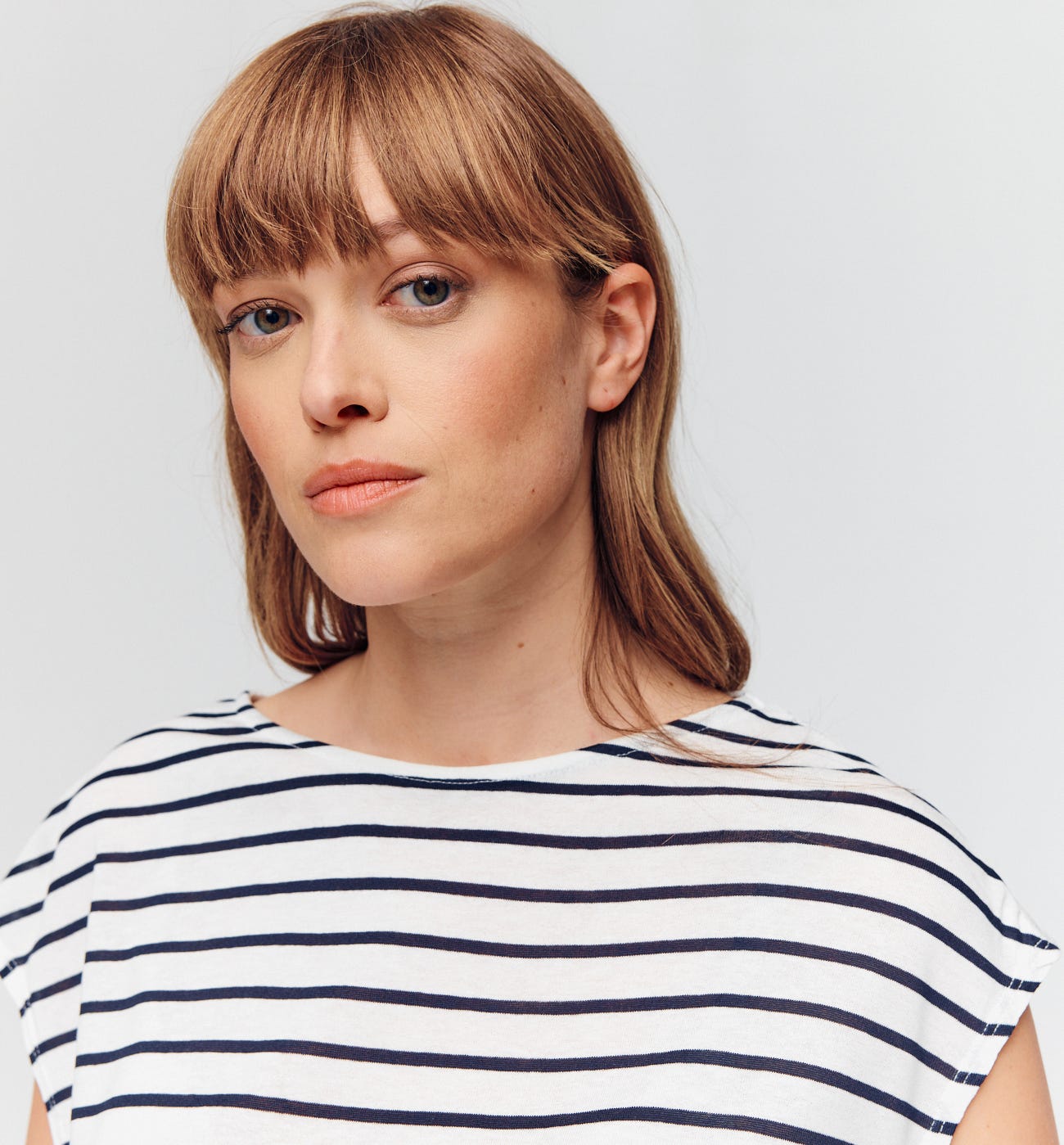T-shirt a righe e pizzo