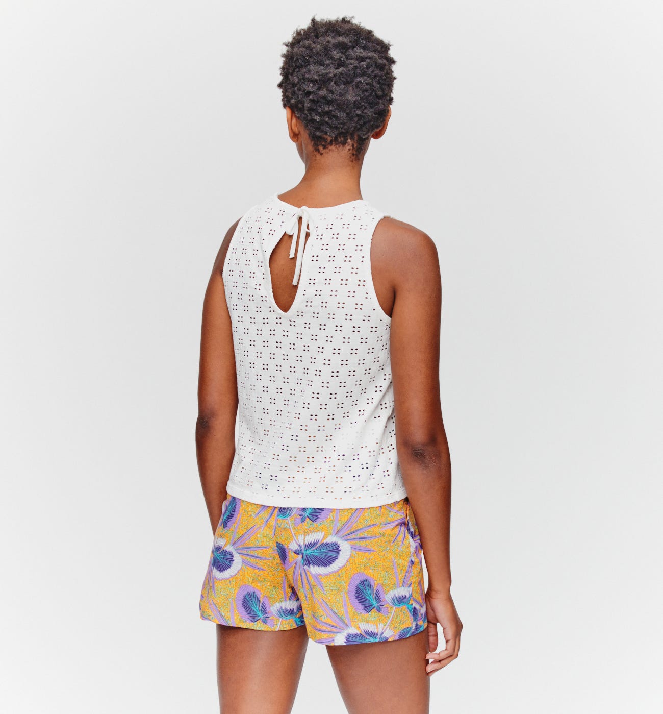 Sleeveless openwork top