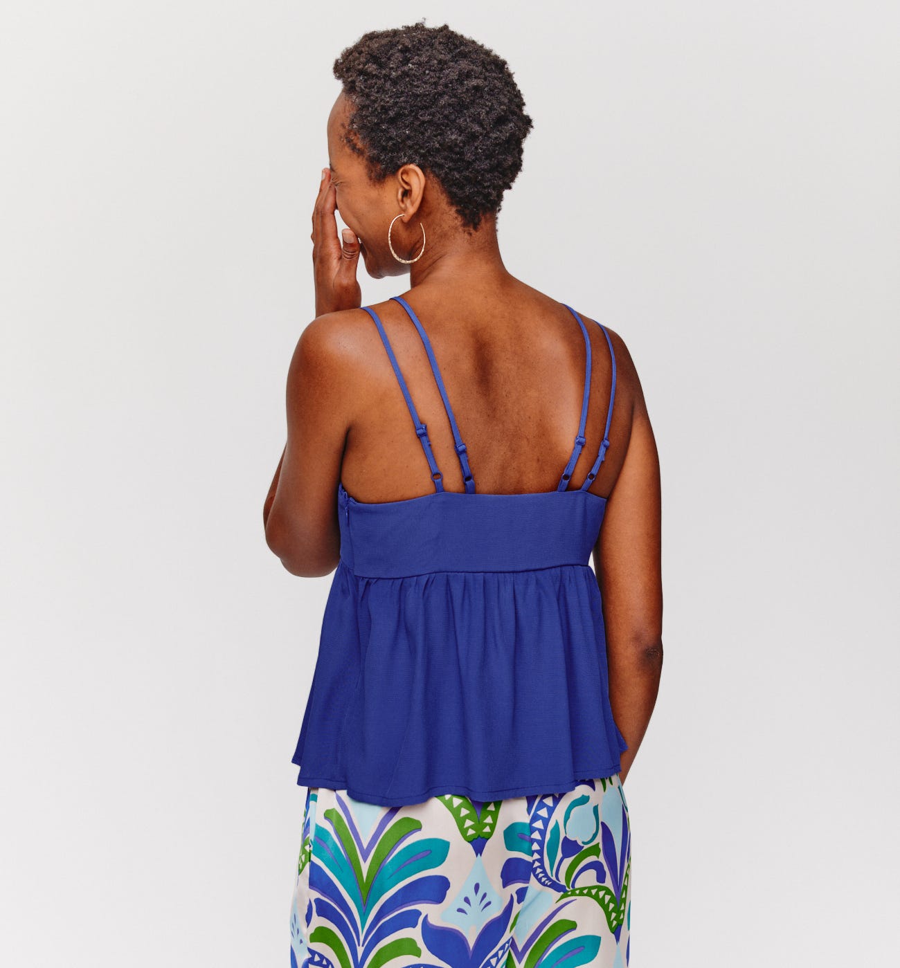 Top scollo con anello