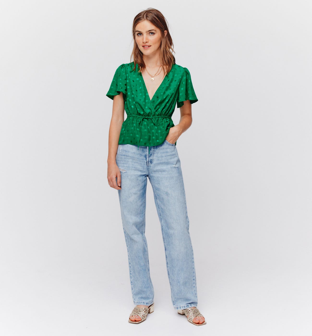 Blusa a pois effetto seta