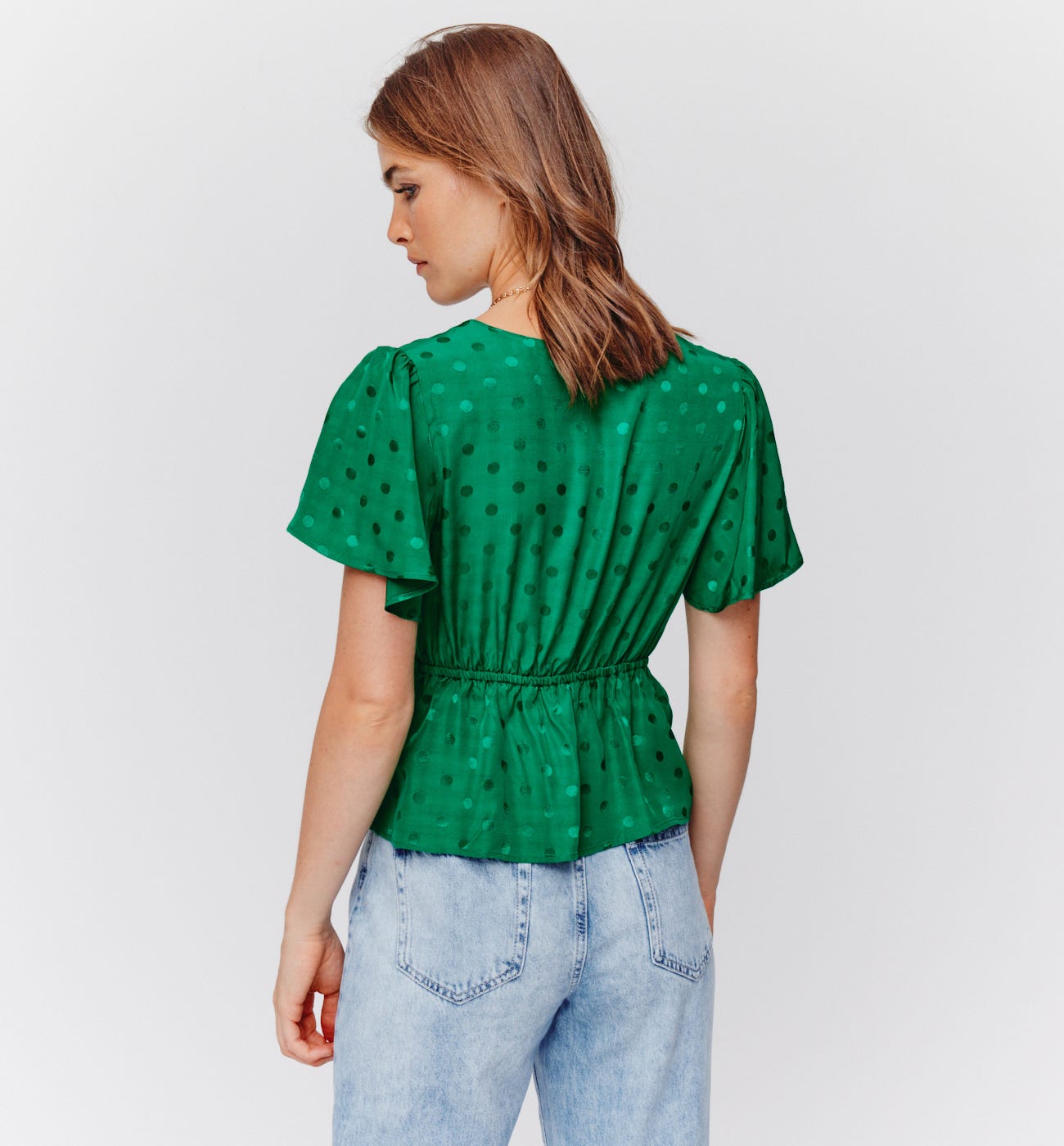 Blusa a pois effetto seta