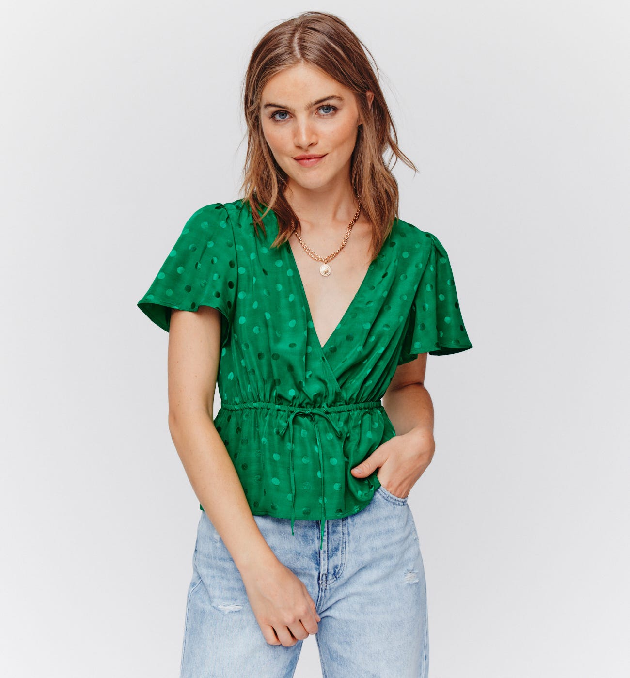 Blusa a pois effetto seta