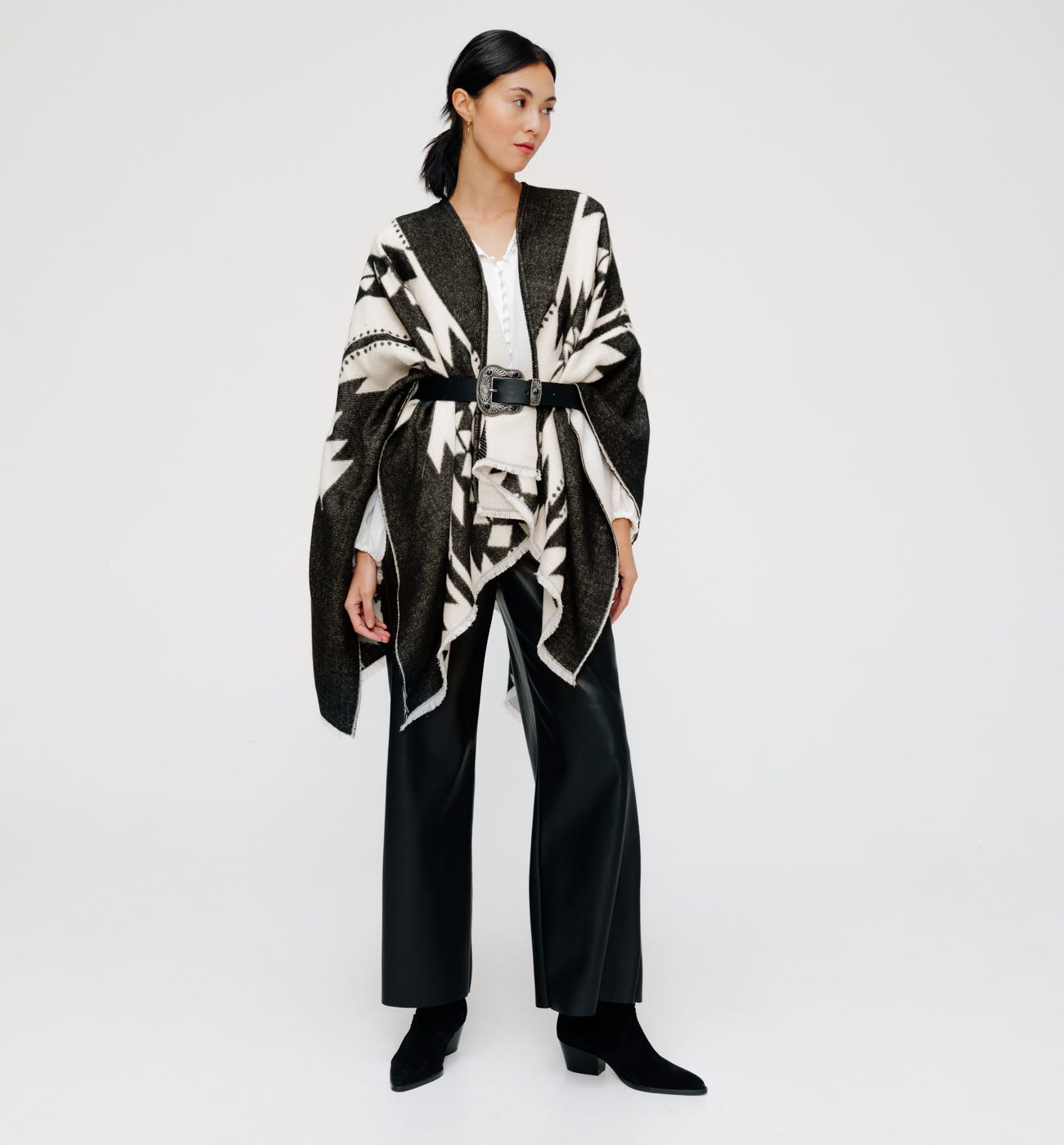 Poncho motivos amerindios
