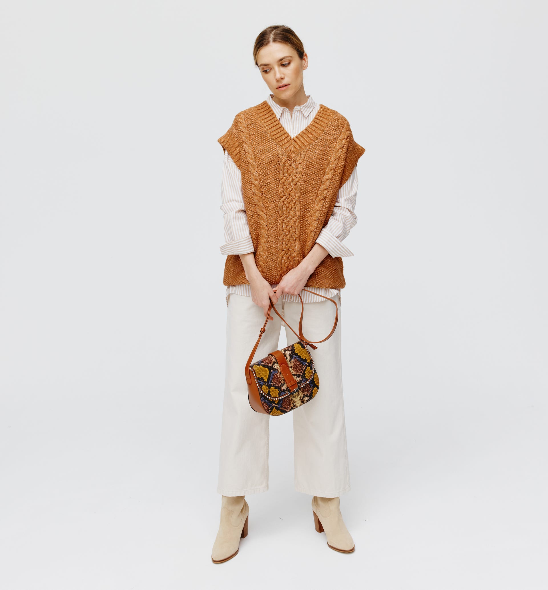 Gilet lungo a trecce