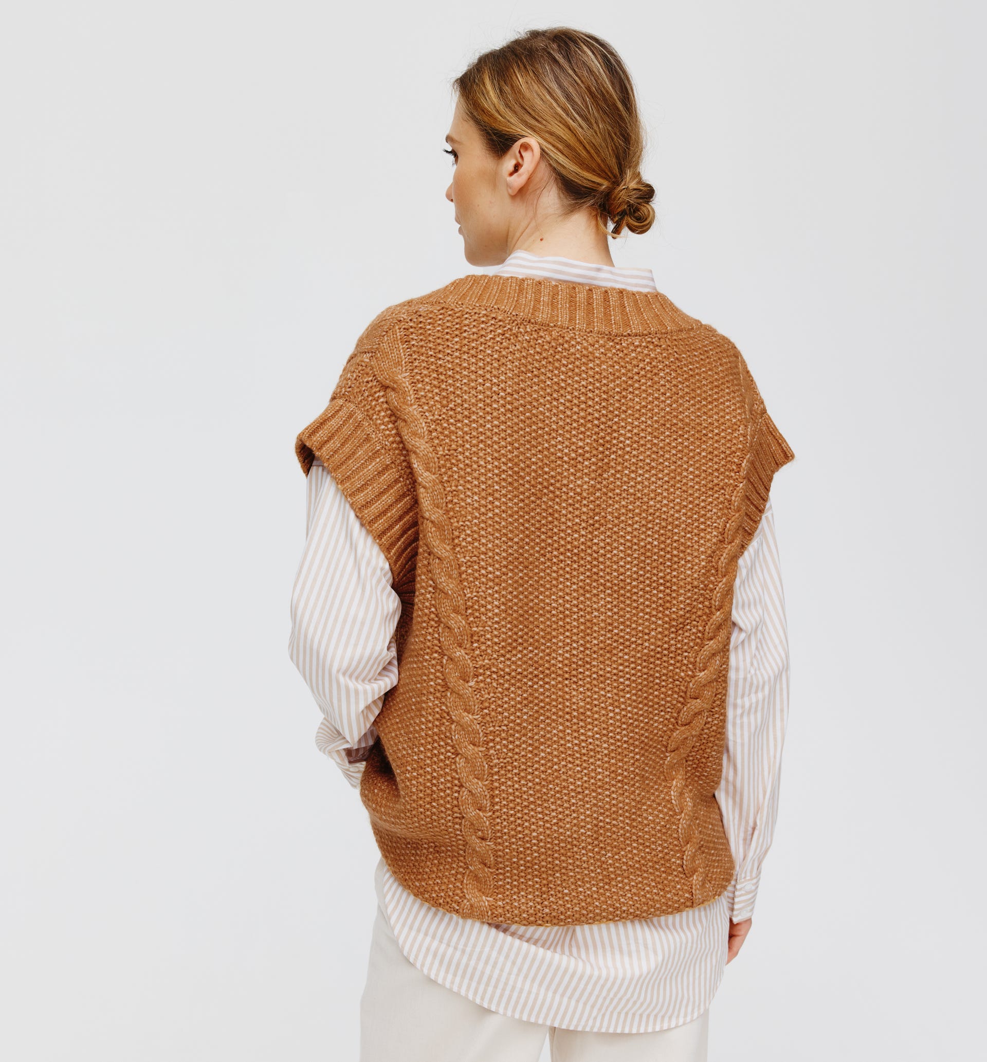 Gilet lungo a trecce