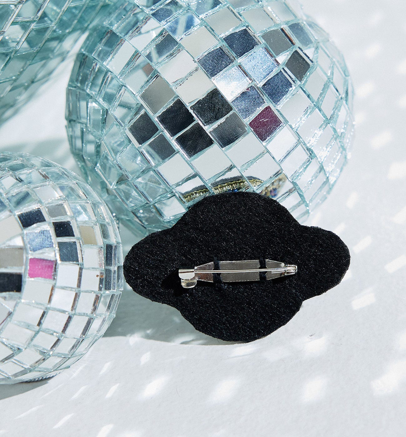 Broche Saturno