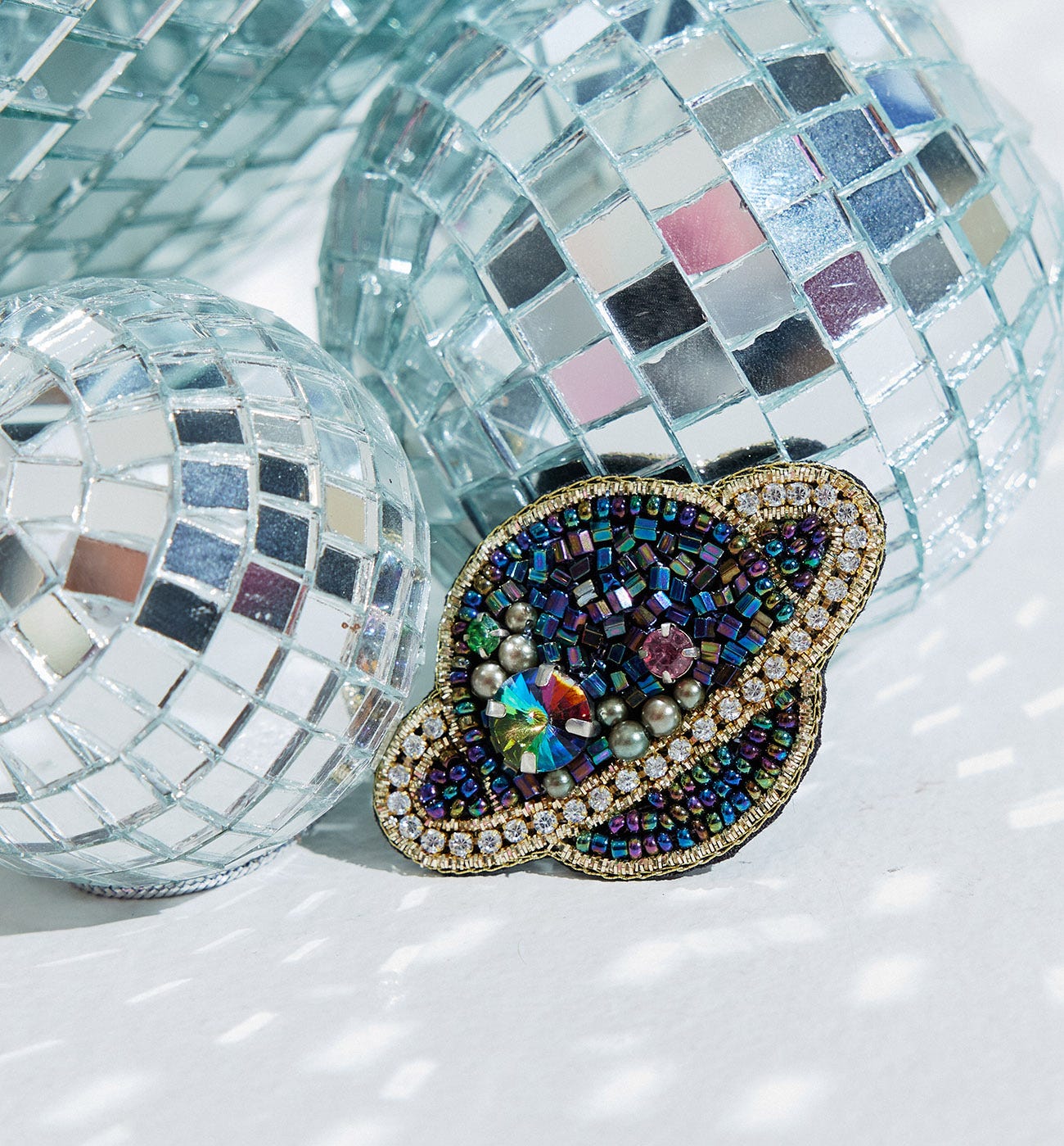 Broche Saturno