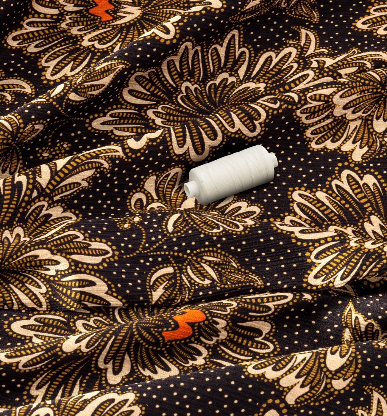 Crepon satin fabric cut