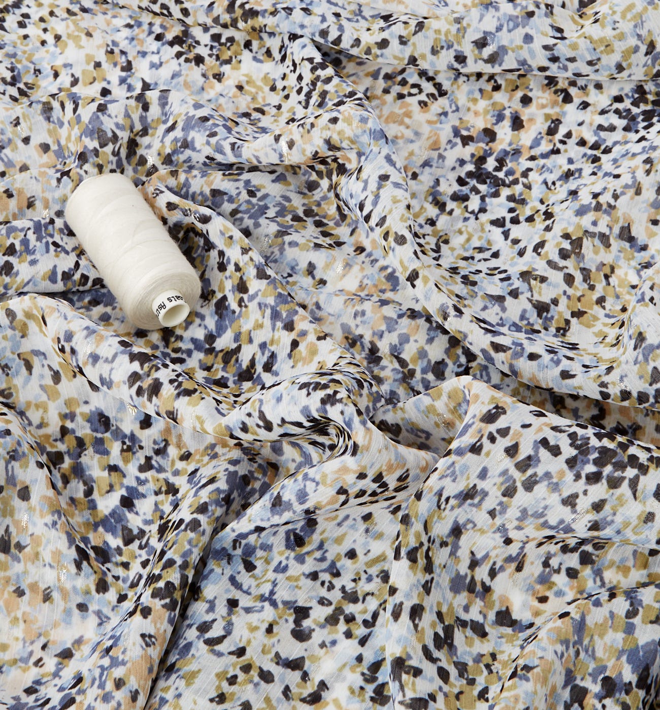 Coupon de tissu voile plumetis