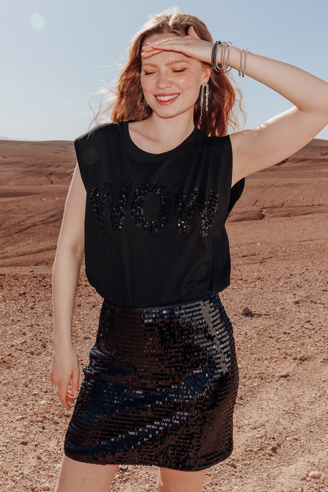 Sequinned slogan top