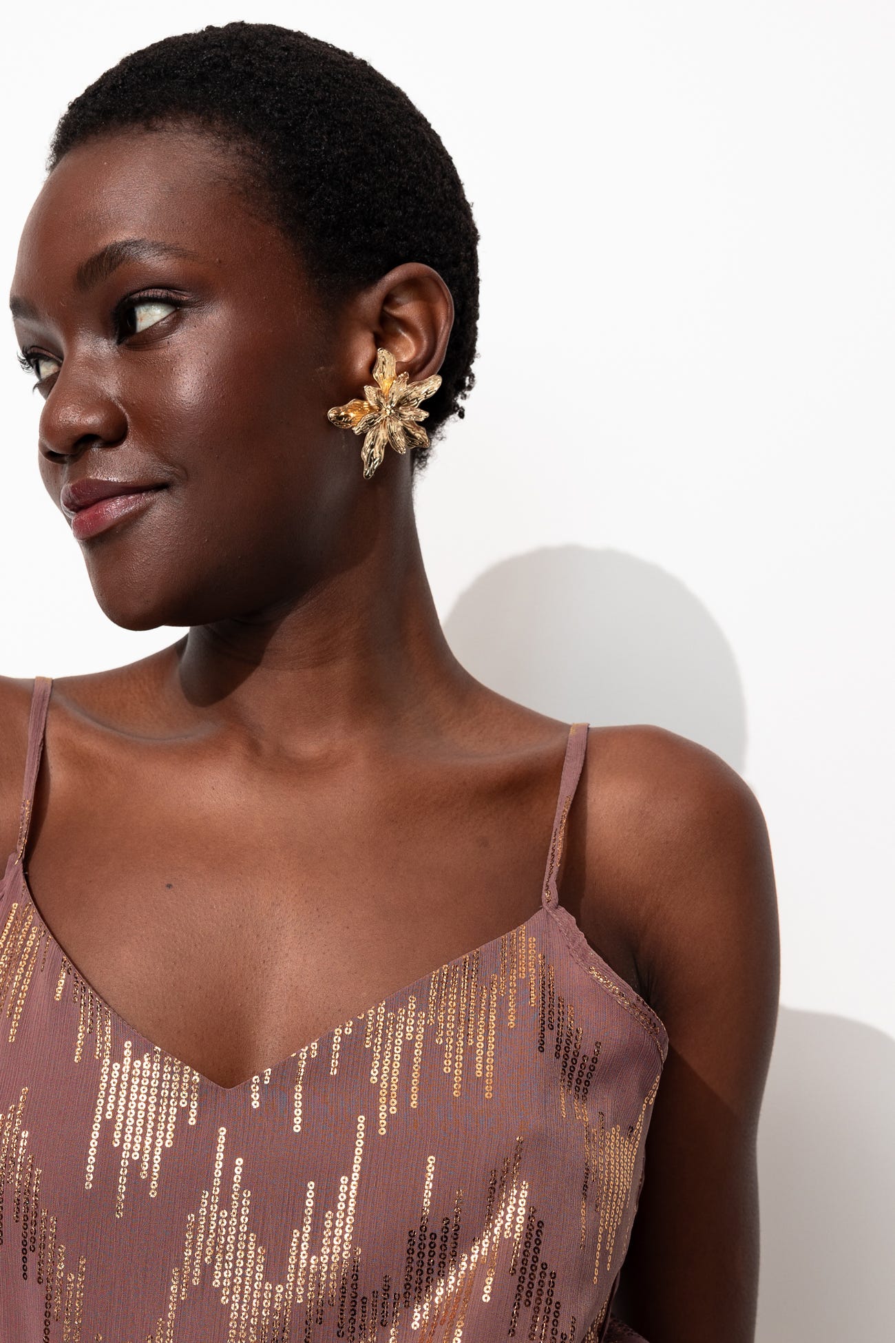 Top glitter con spalline