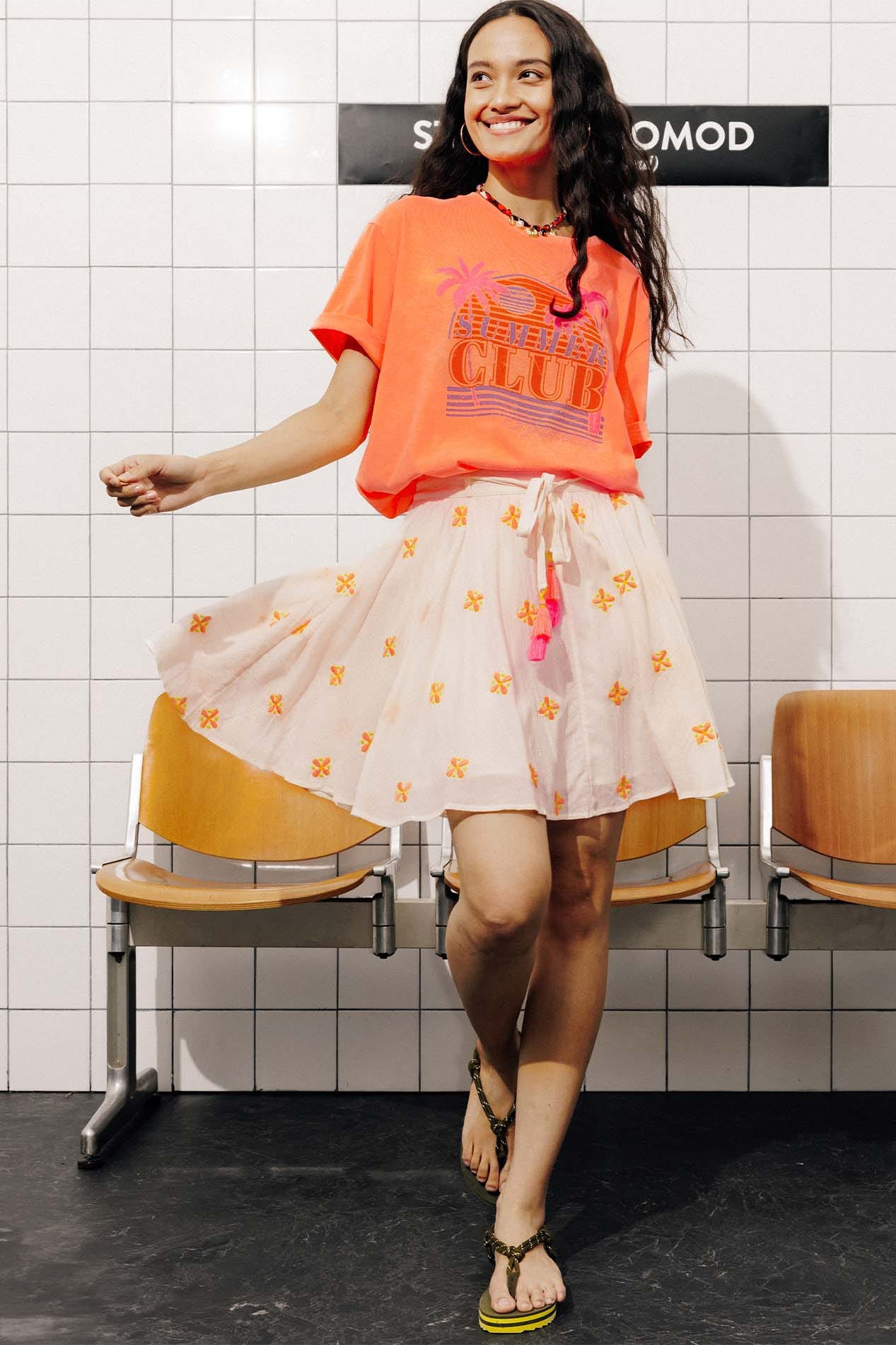 Short bright embroidered skirt