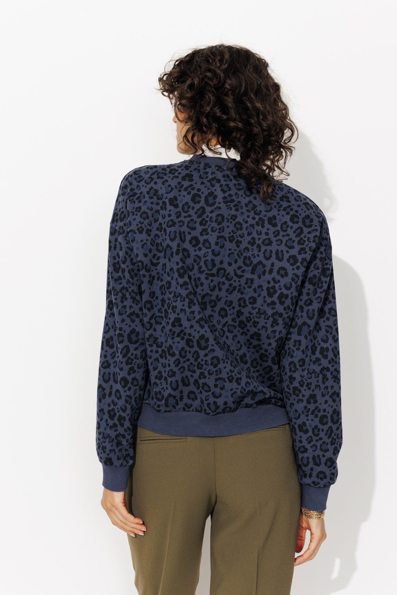 Sudadera estampado leoparto