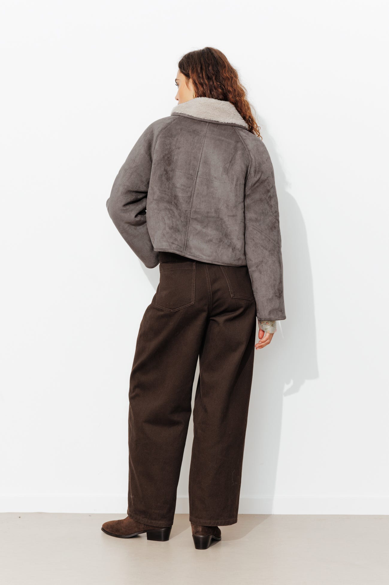 Manteau en moumoute retournée