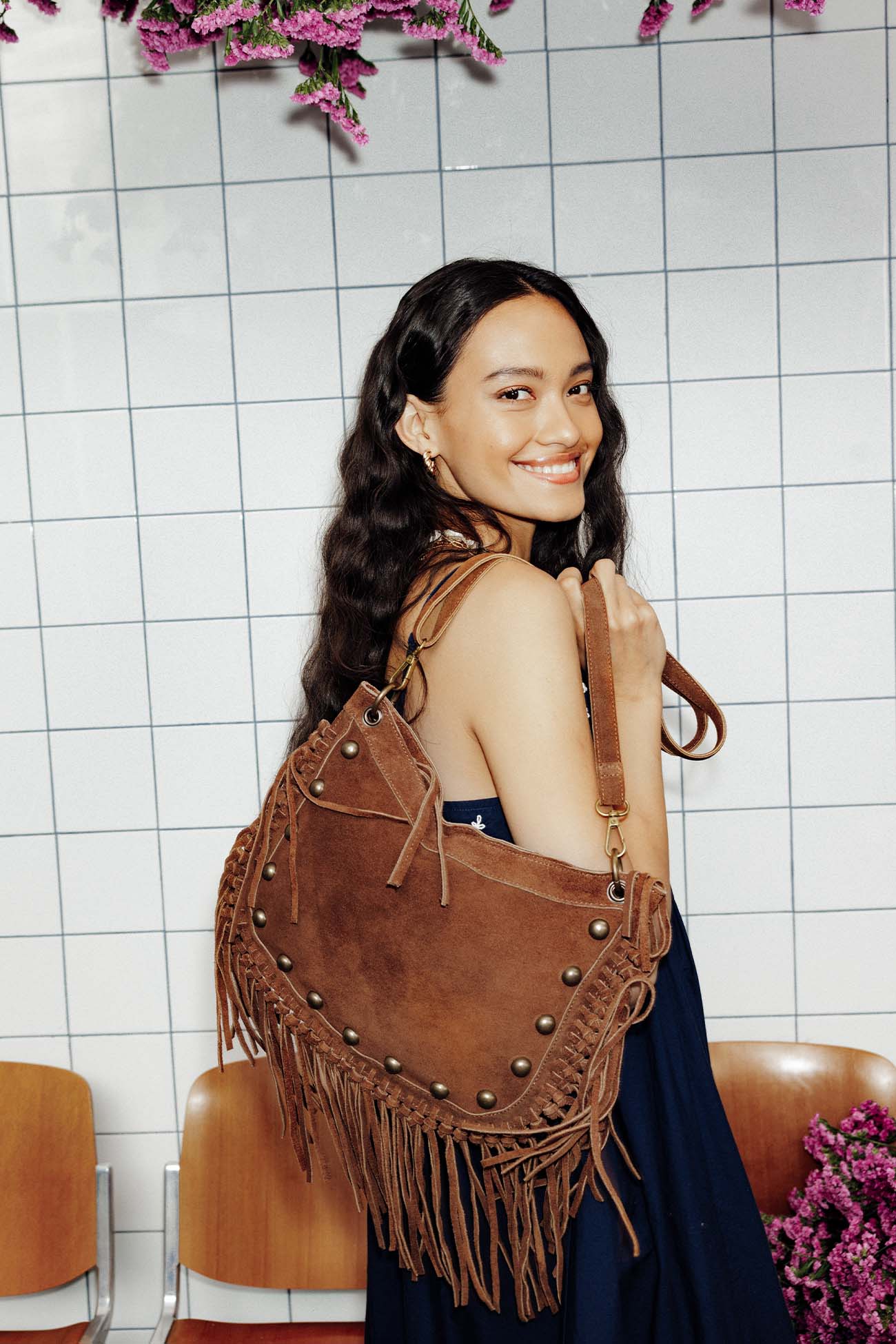 Leather fringed handbag