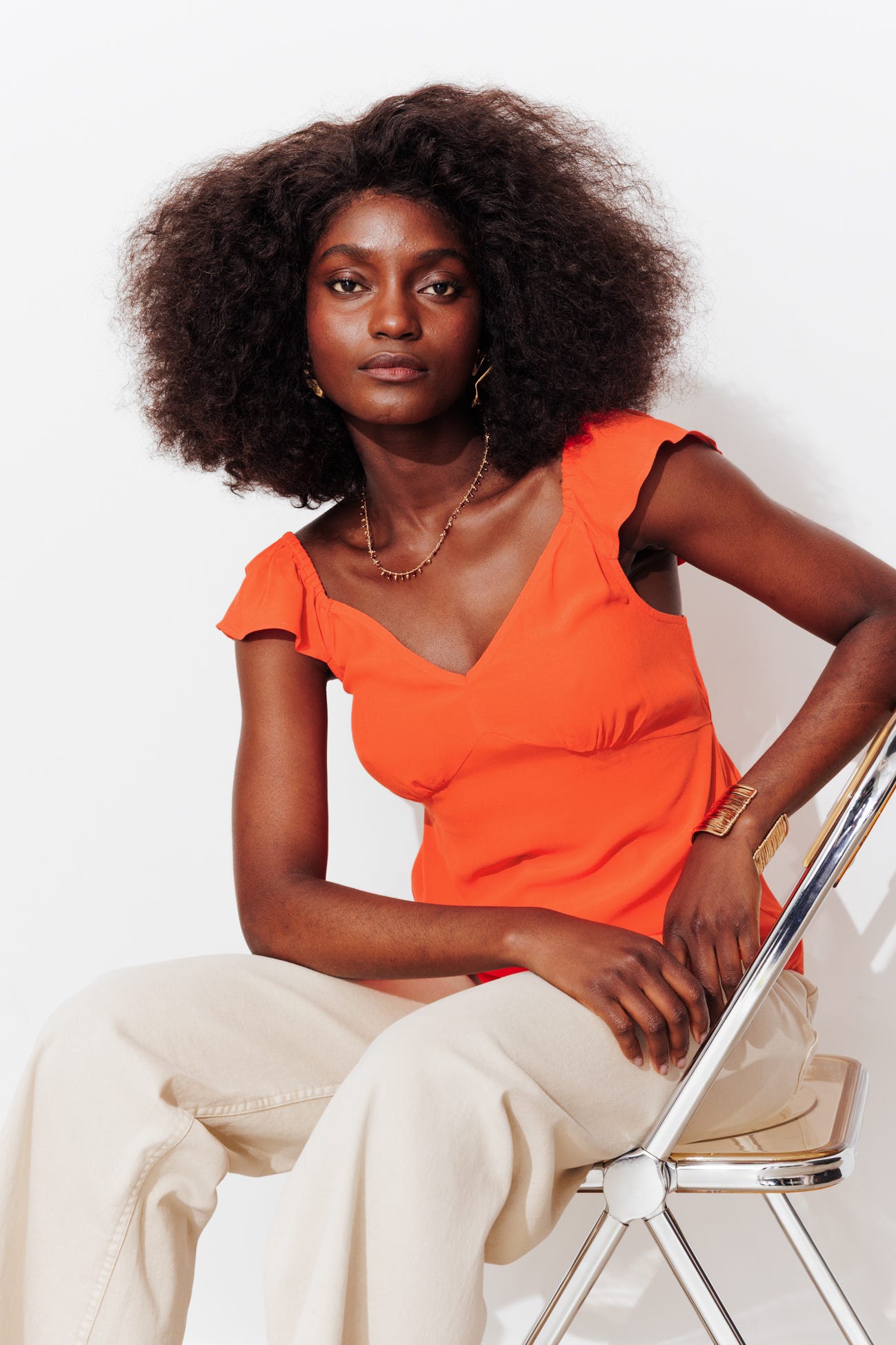 Top con spalline a tinta unita