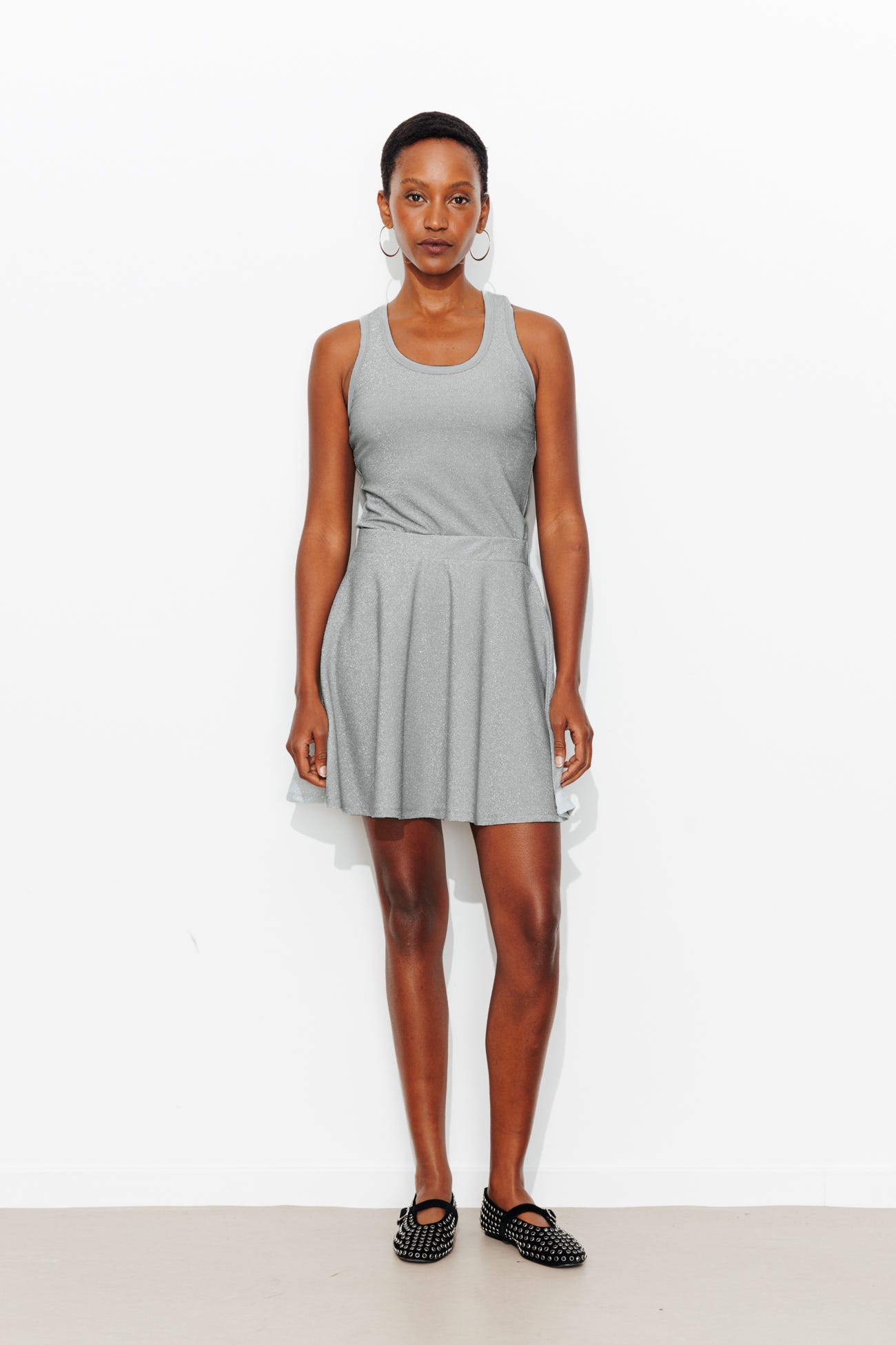 Falda corta con brillo