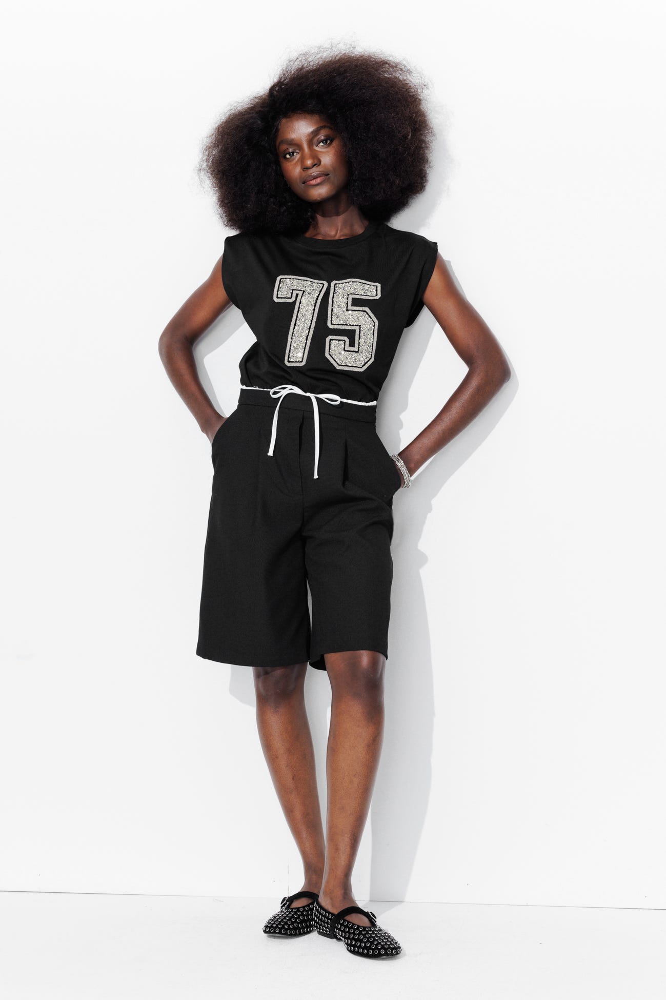 T-shirt con dettaglio glitter