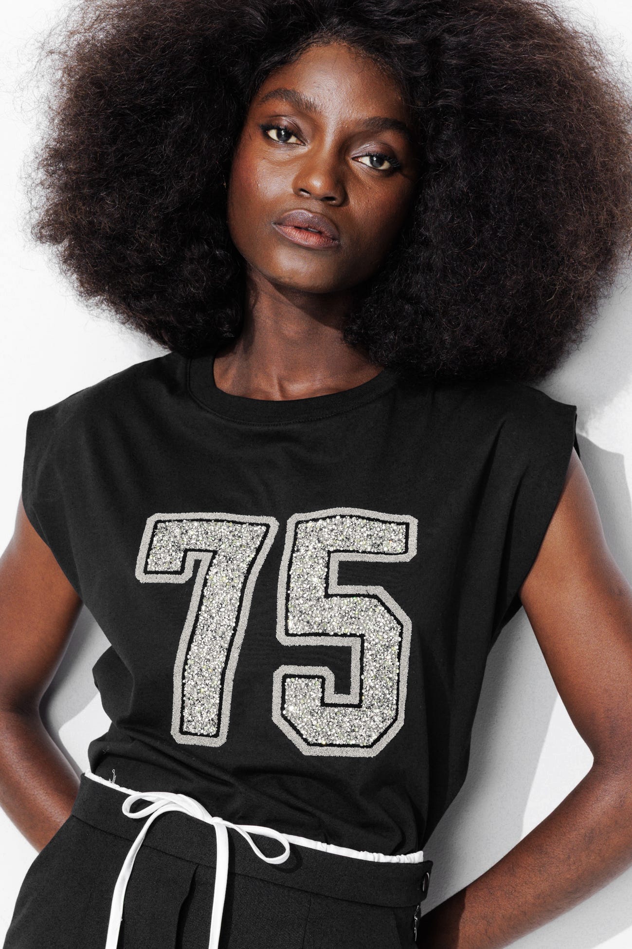 T-shirt con dettaglio glitter