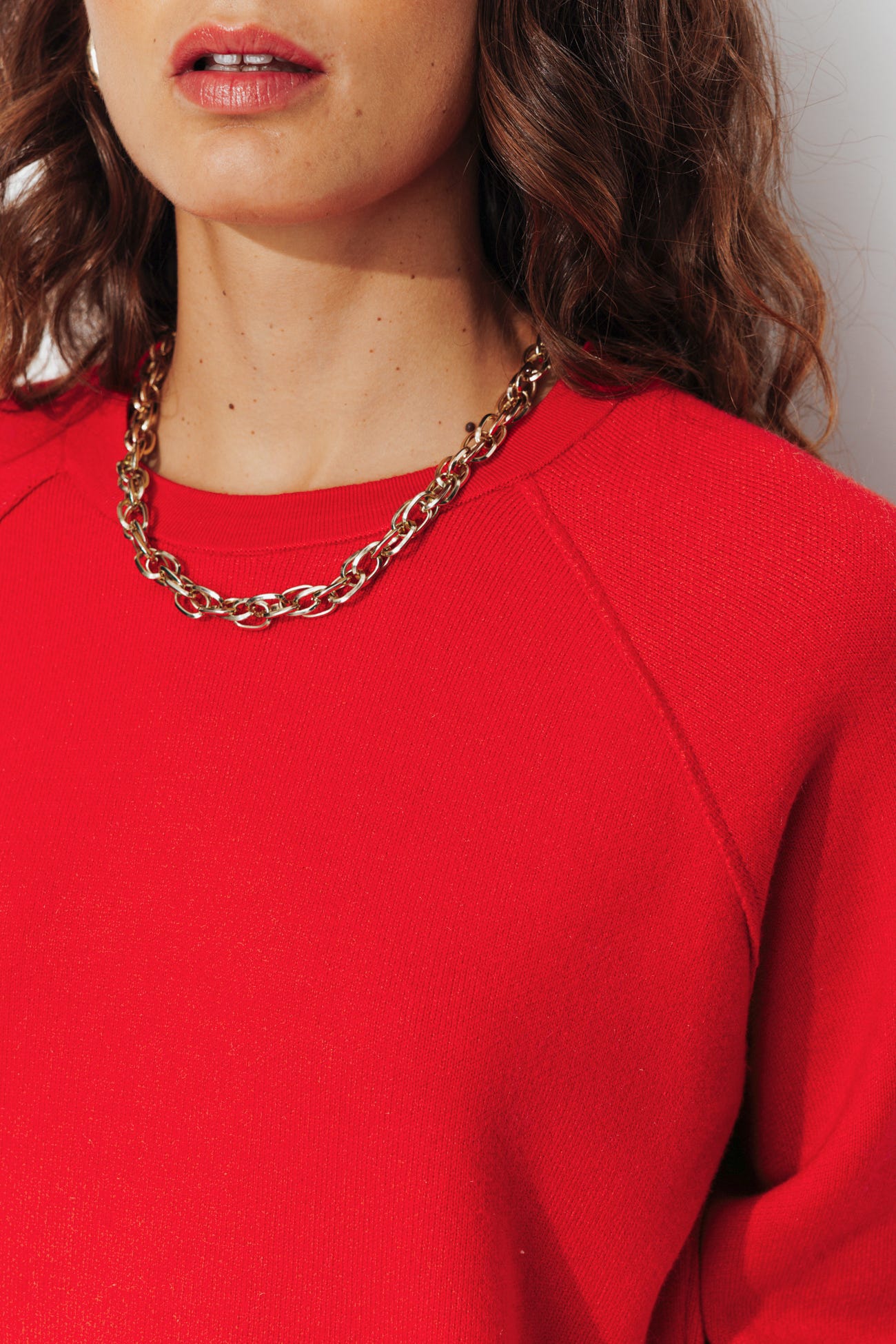 Pull uni col rond Femme