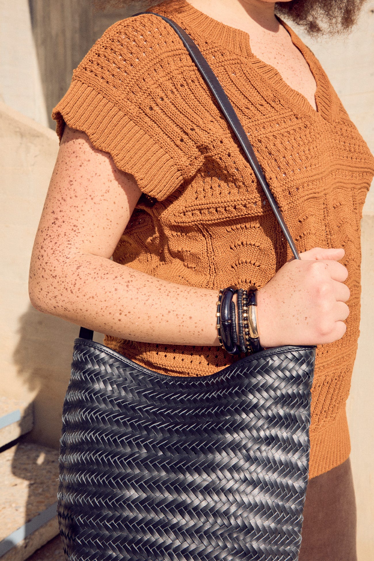 Sac seau en cuir tressé Femme