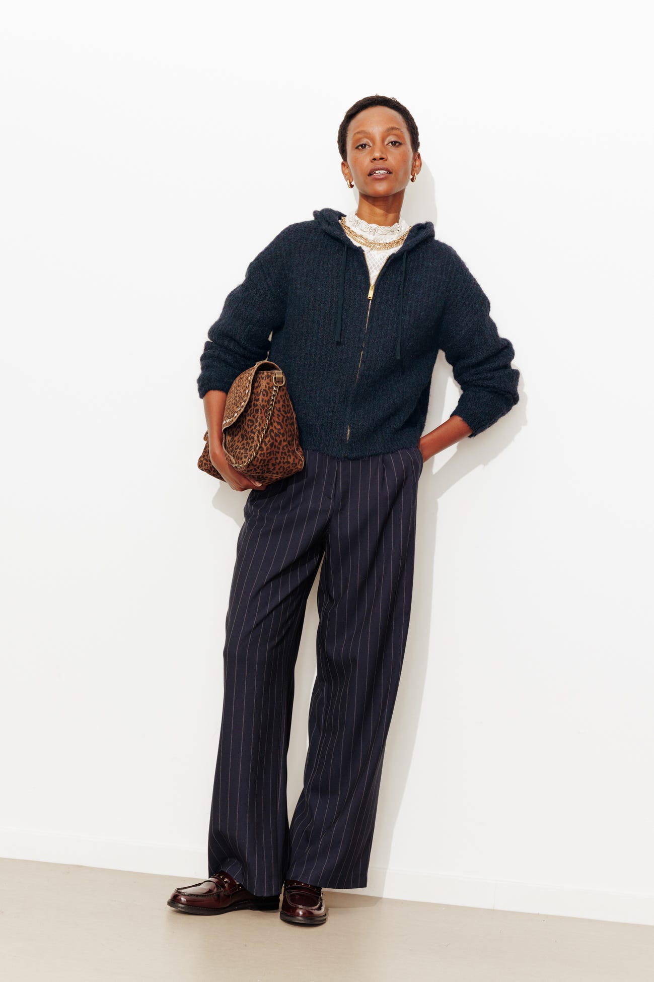 Cárdigan fluffy con capucha