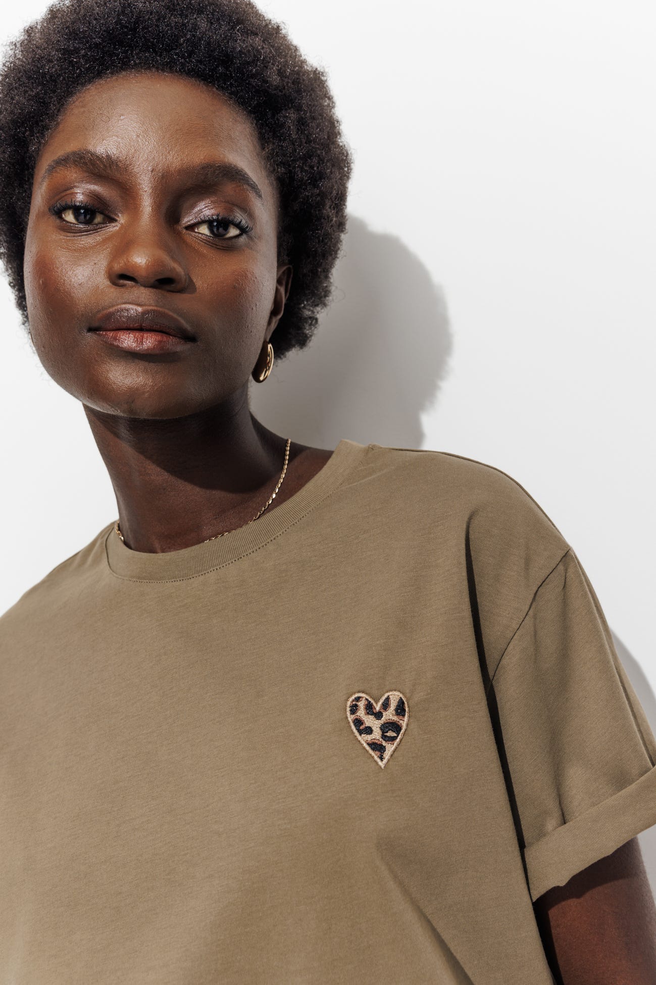 Top with heart motif