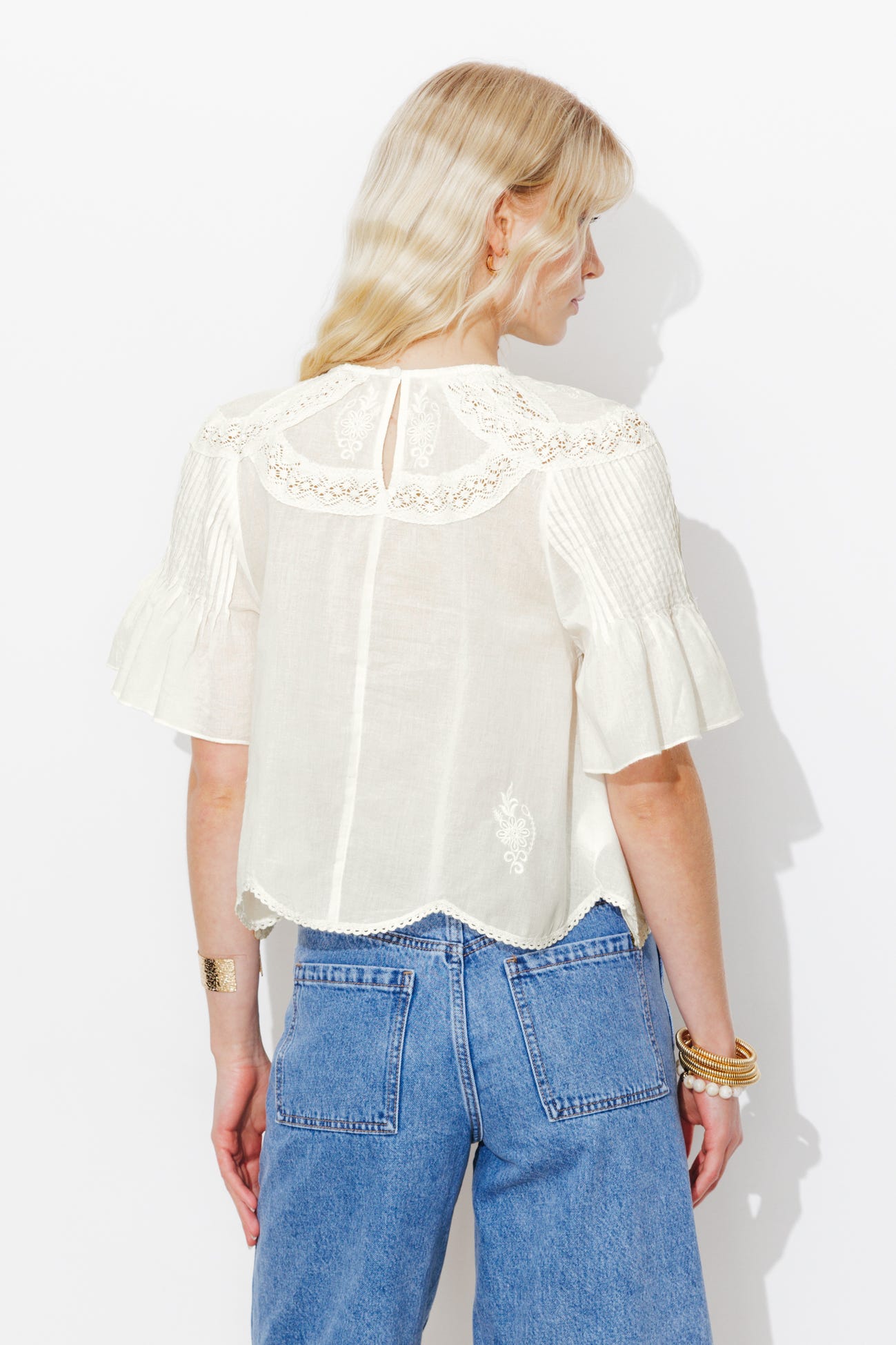 Flared embroidered blouse