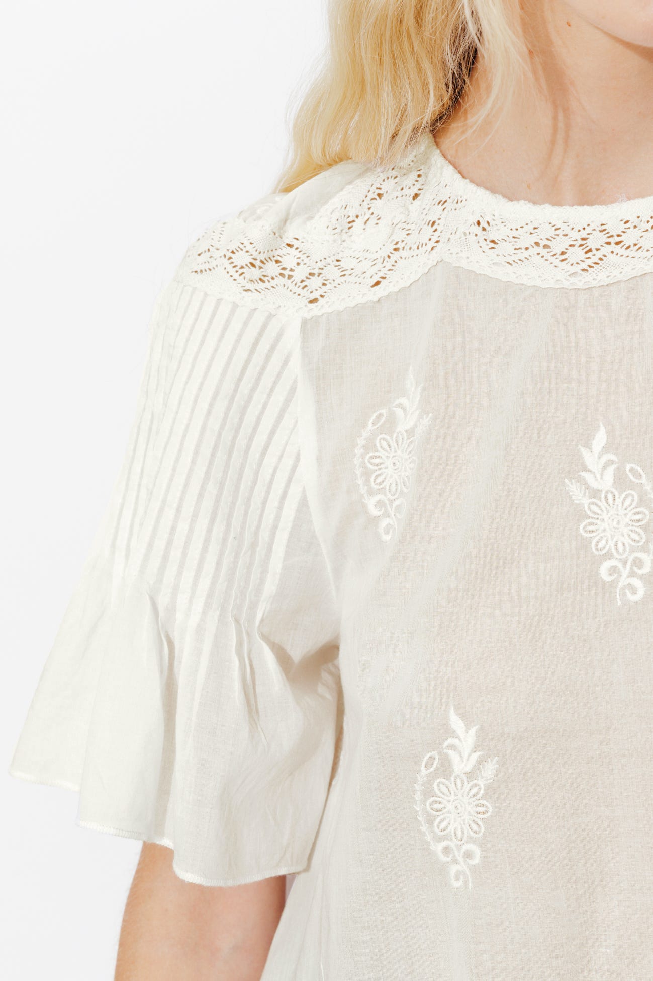 Flared embroidered blouse