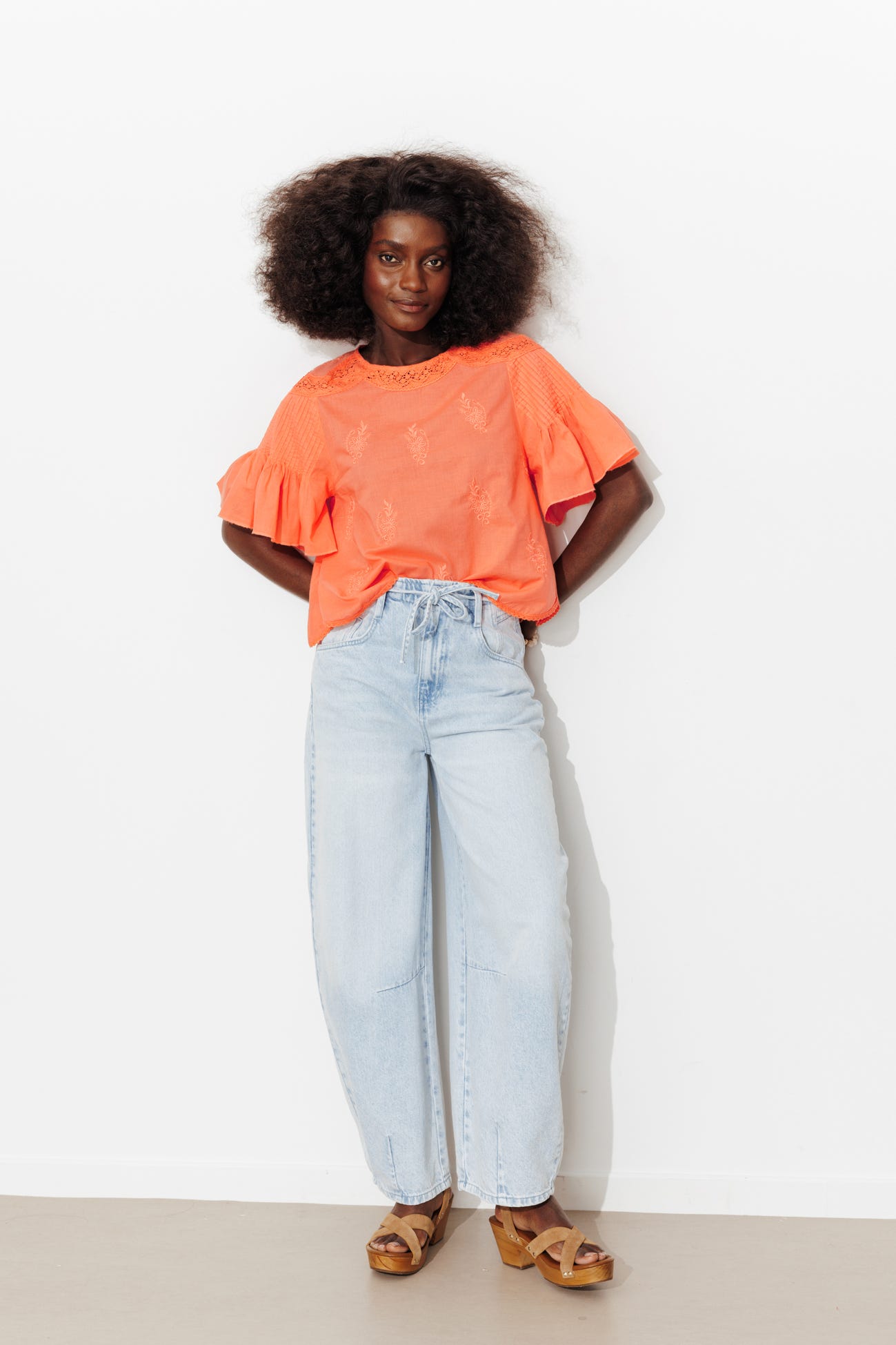 Flared embroidered blouse