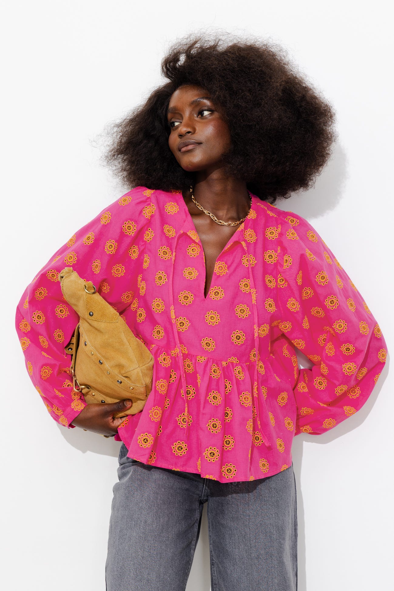 Blusa ricamata traforata