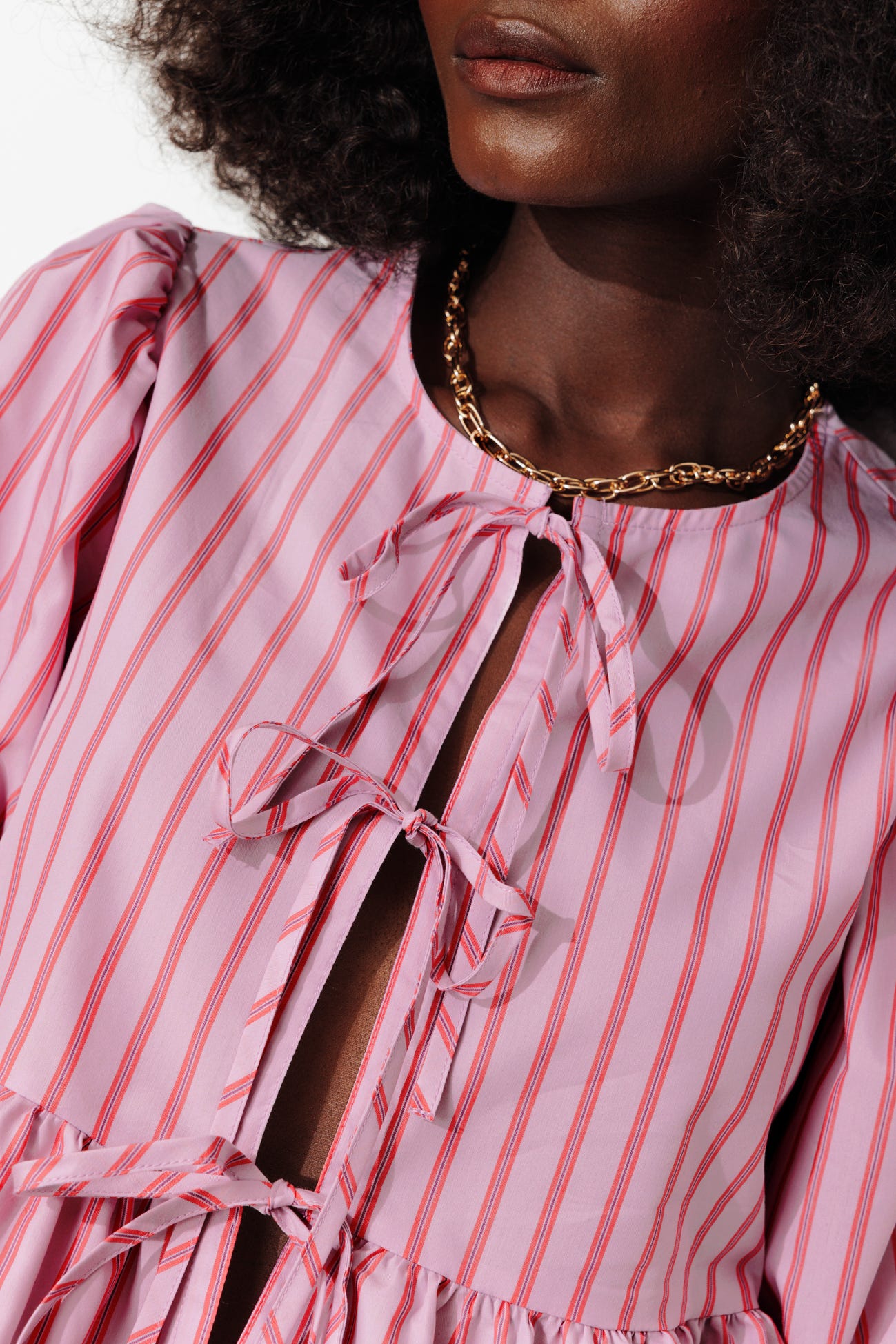 Blouse rayée à nouettes Femme