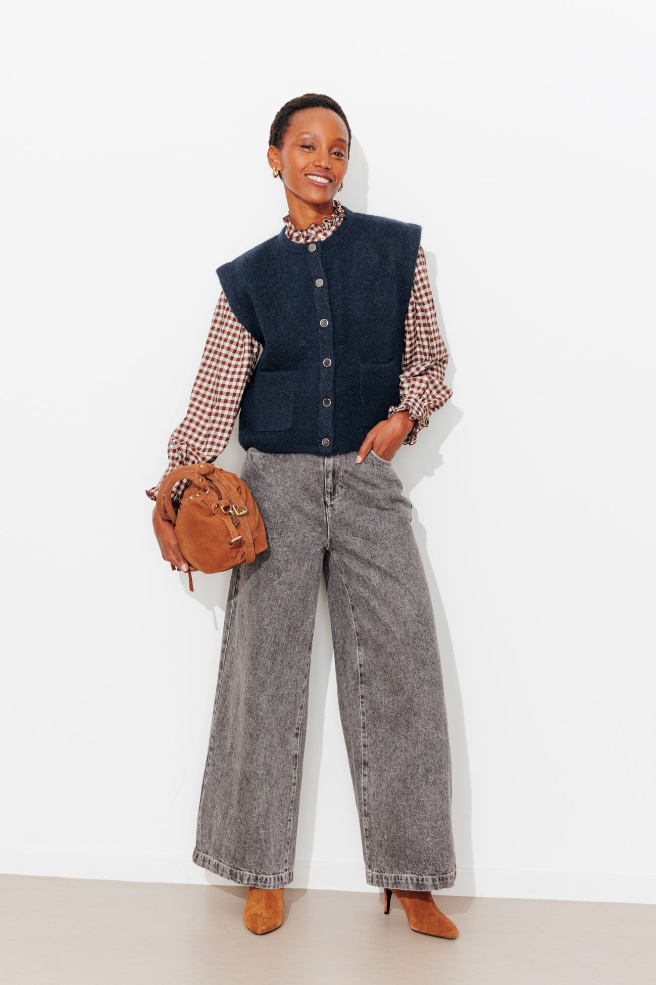 Cardigan corto smanicato