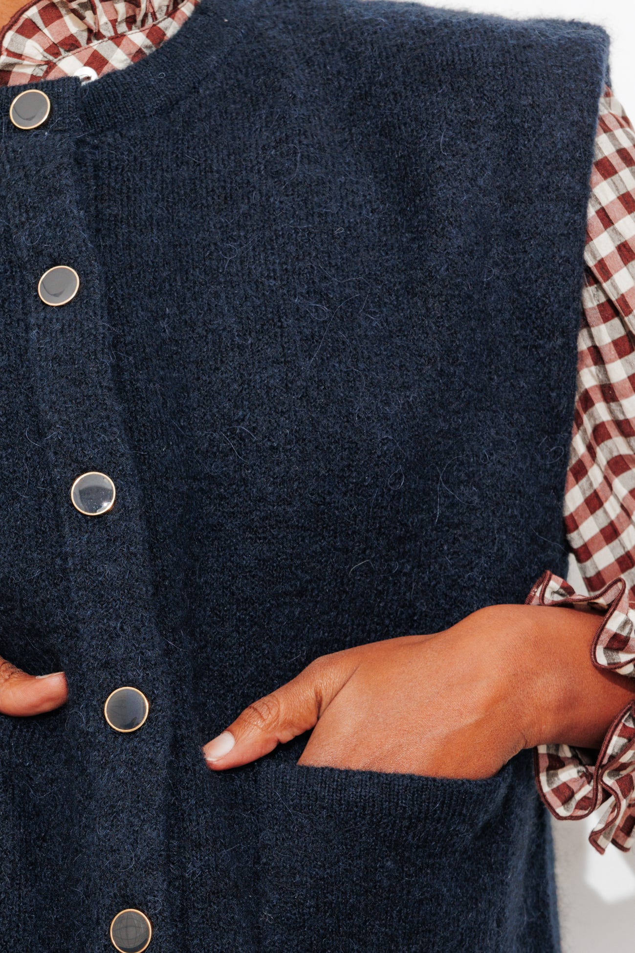 Cardigan corto smanicato