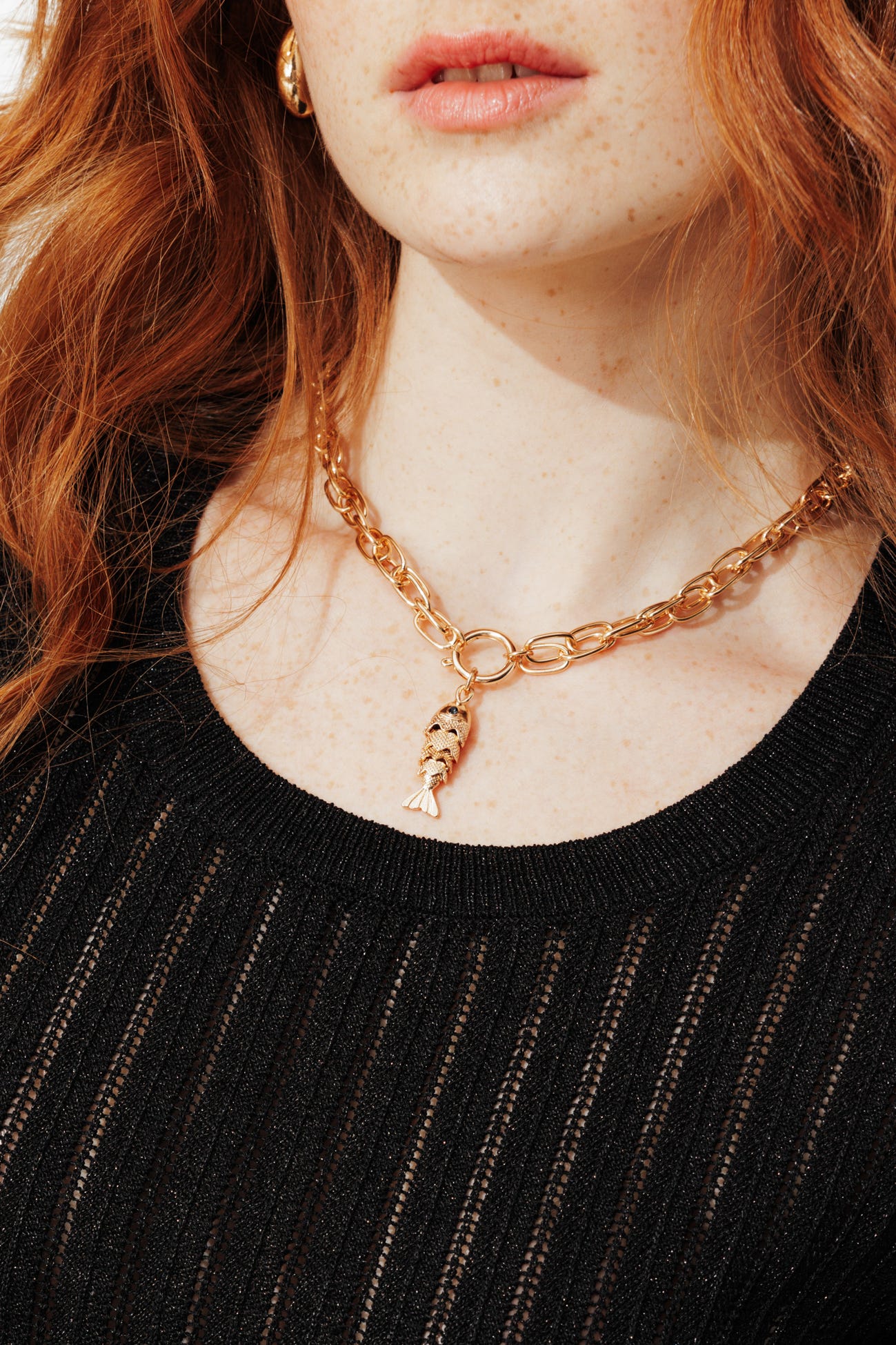 Kurzer Glitzerpullover