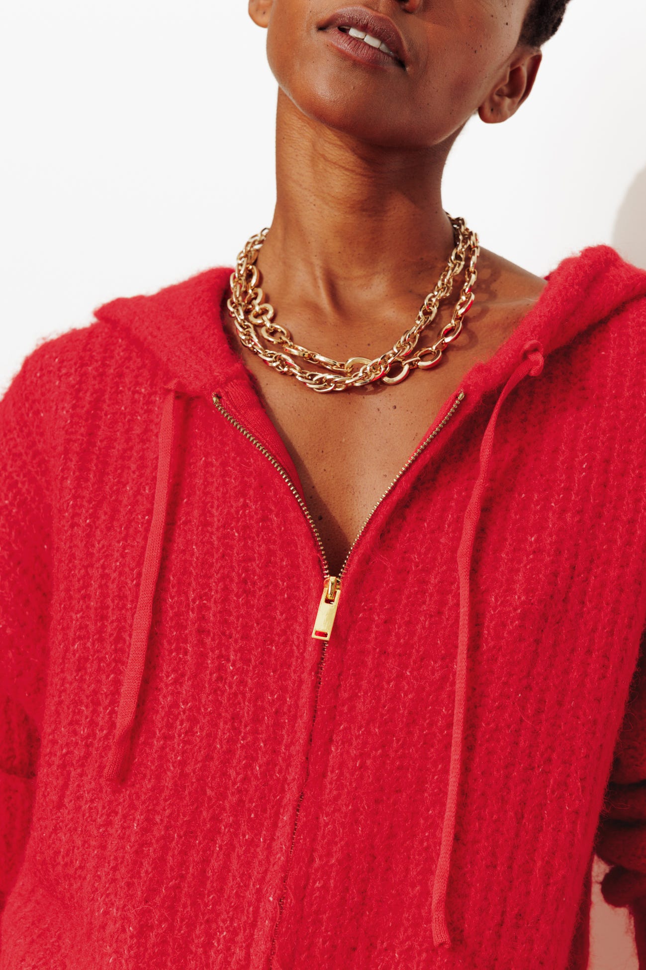 Cárdigan fluffy con capucha