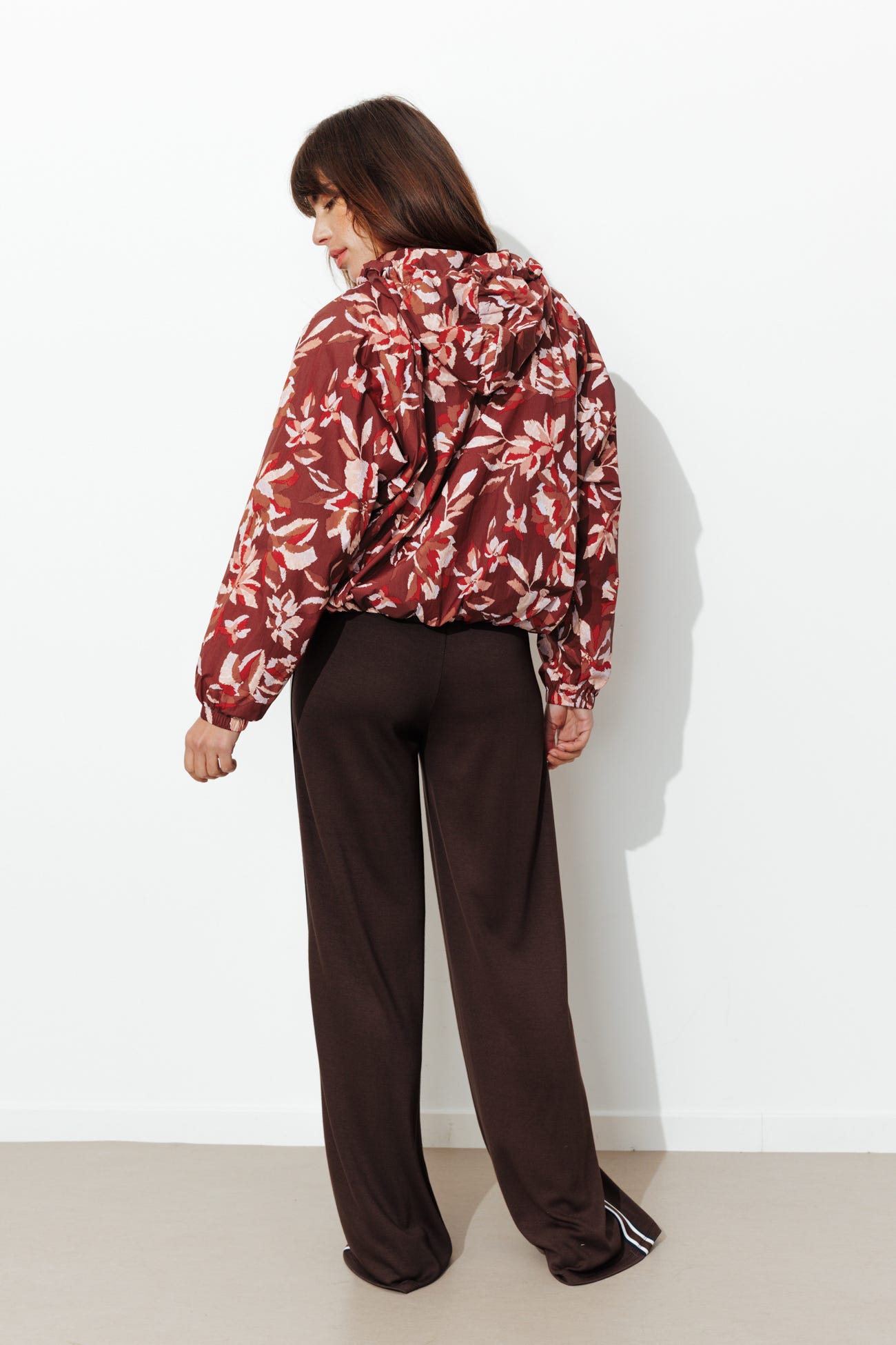 Giacca a vento con cappuccio