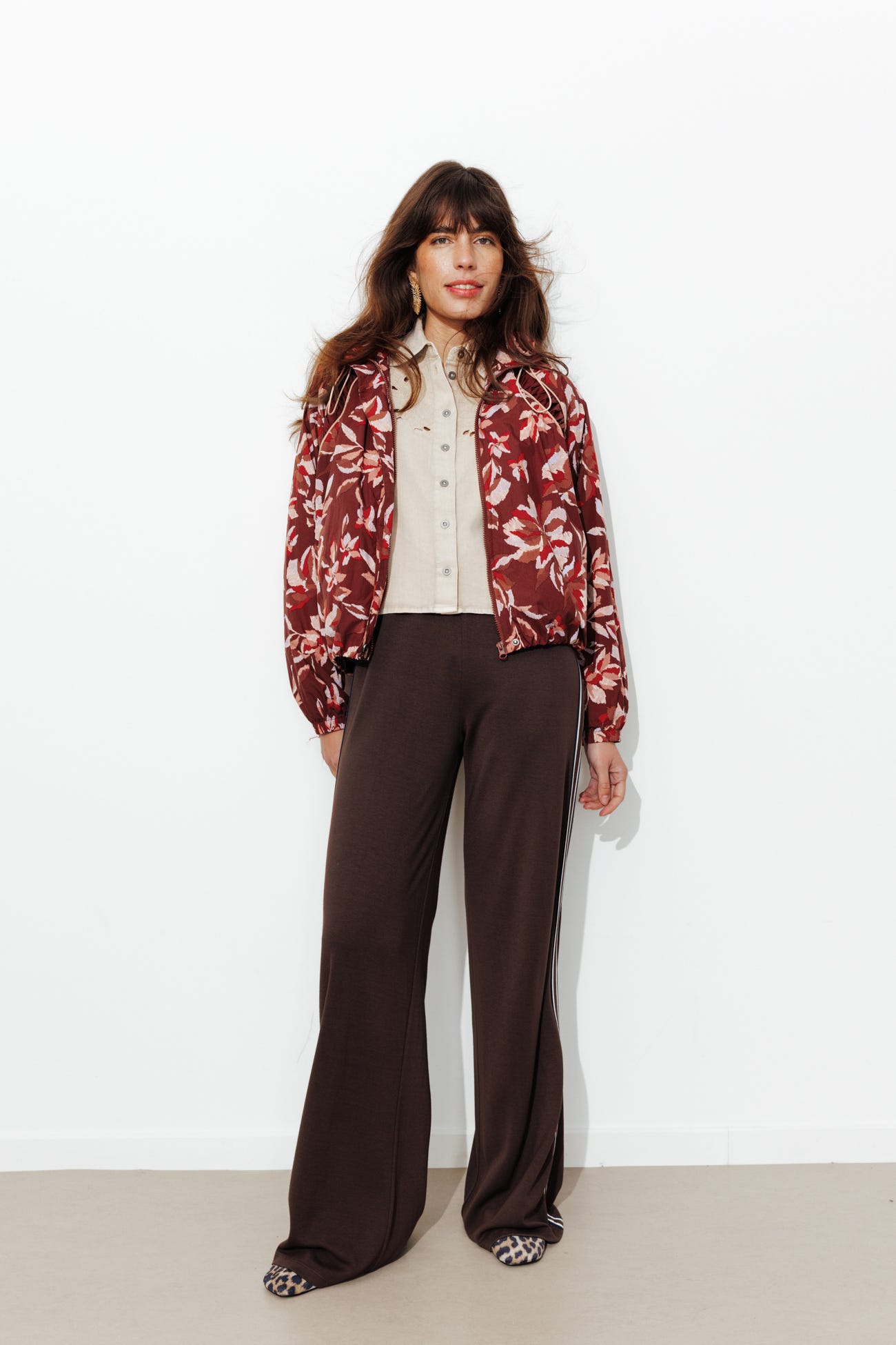 Giacca a vento con cappuccio