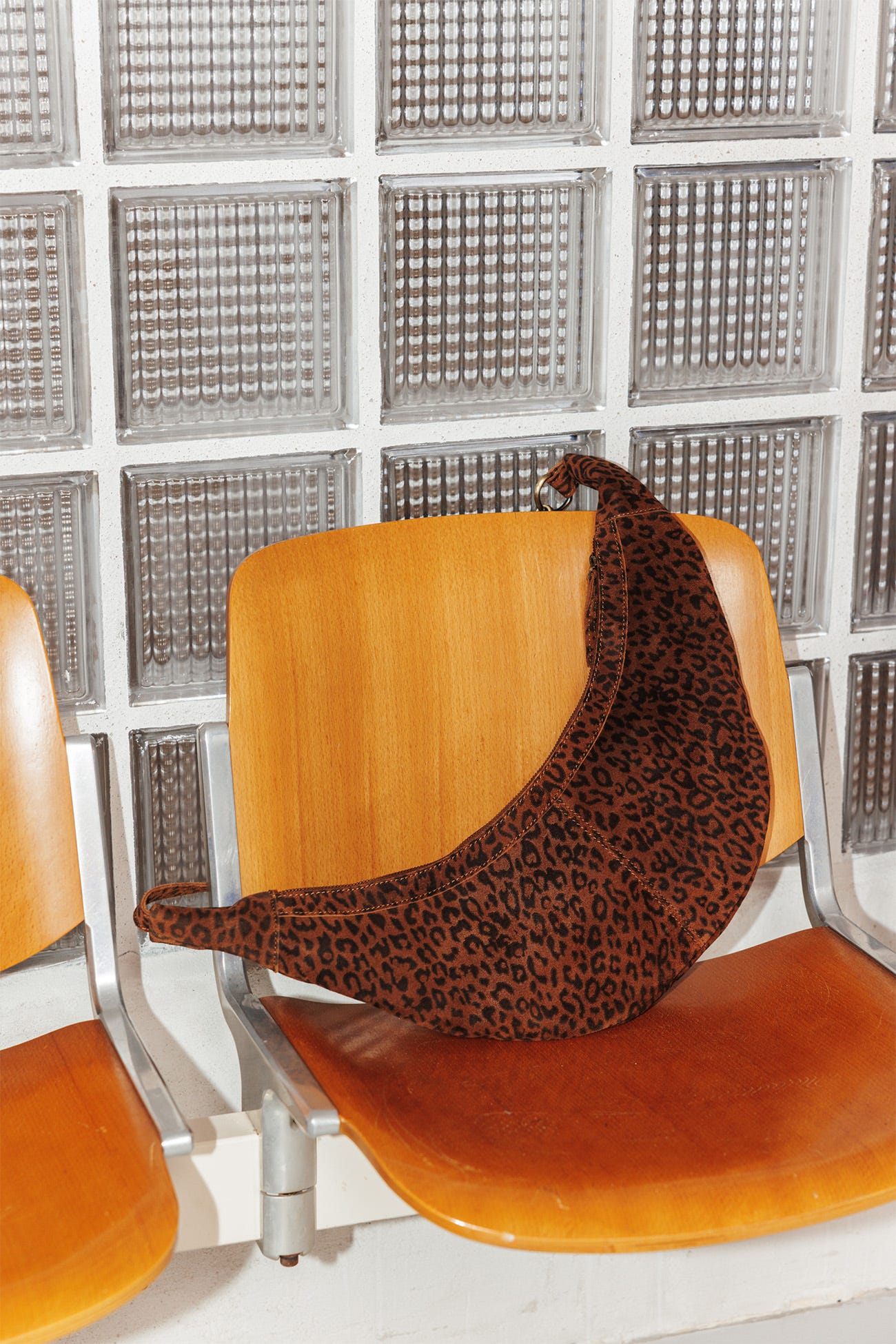Leather leopard crescent bag
