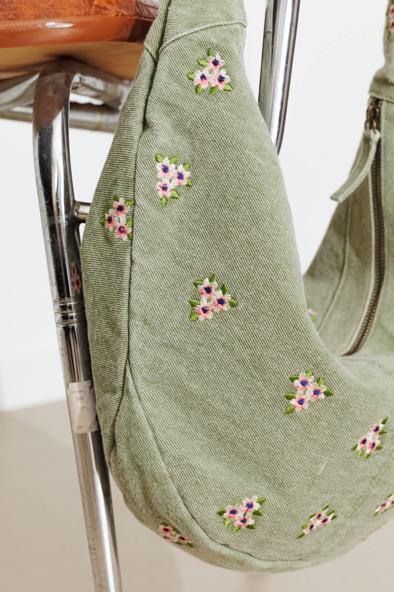 Half-moon embroidered bag