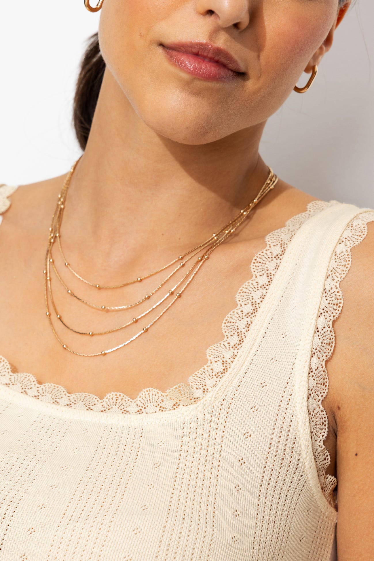 Top calado pointelle y encaje