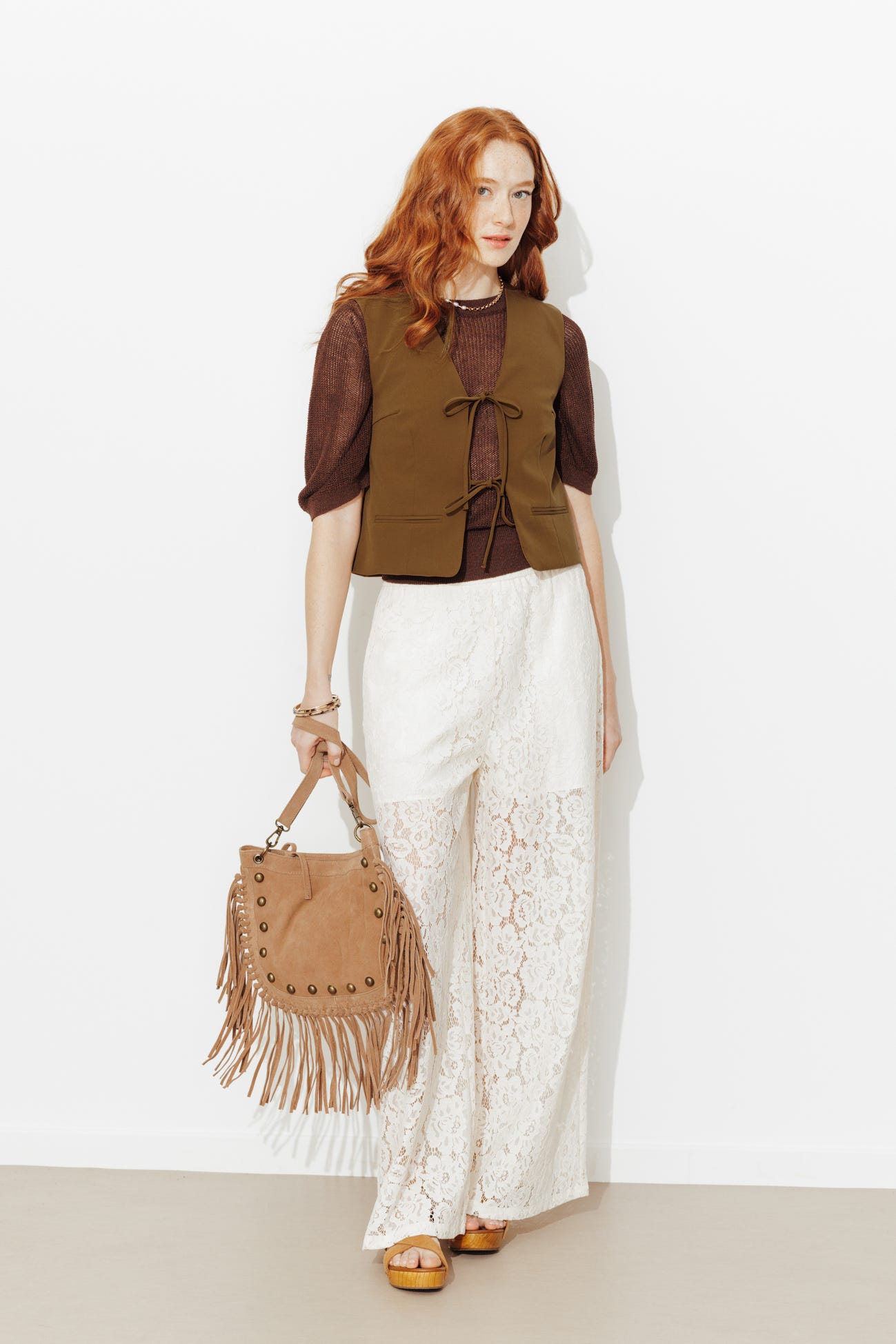 Gilet a t. unita da allacciare