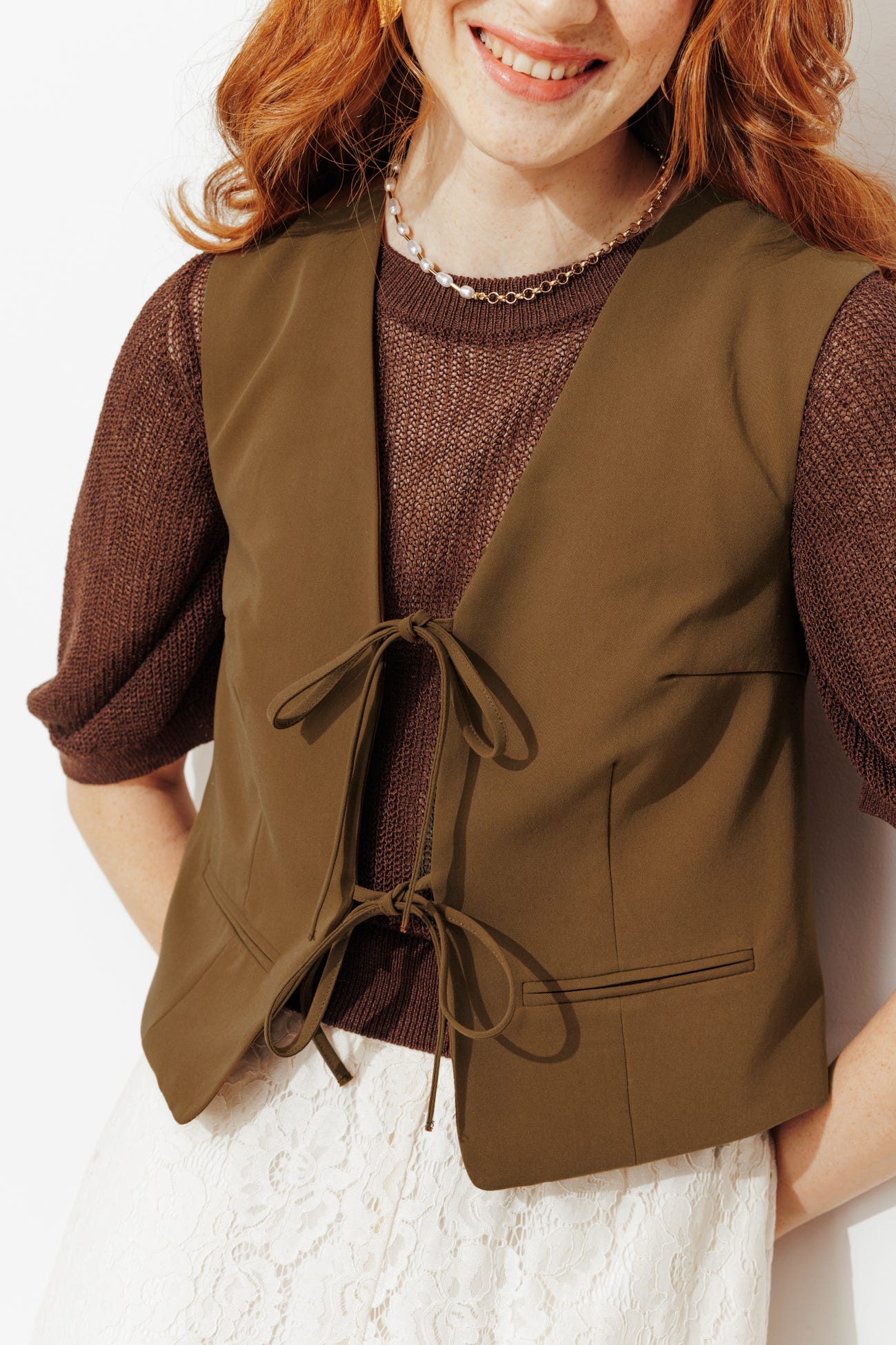 Gilet a t. unita da allacciare