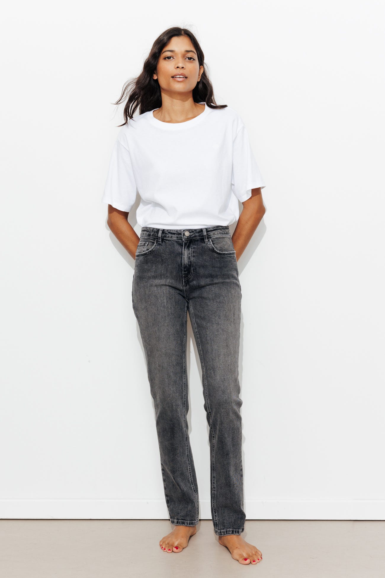 Jean slim de tiro medio-alto