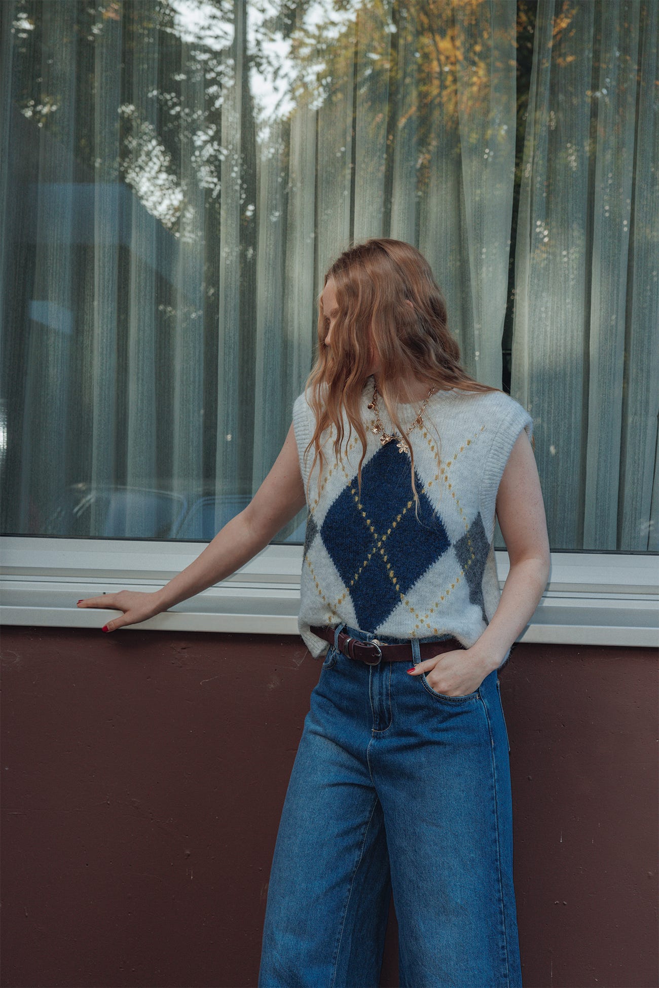 Pull sans manches à carreaux