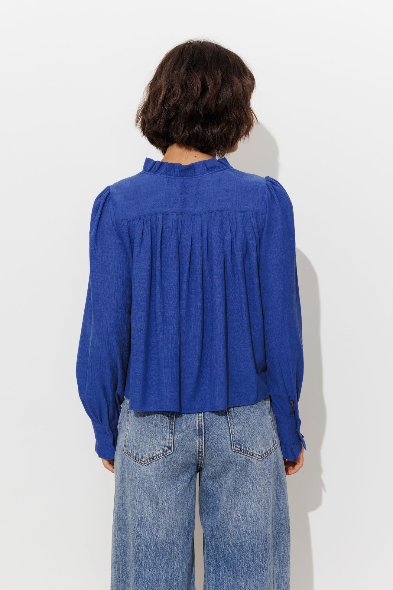 Frilly neckline blouse