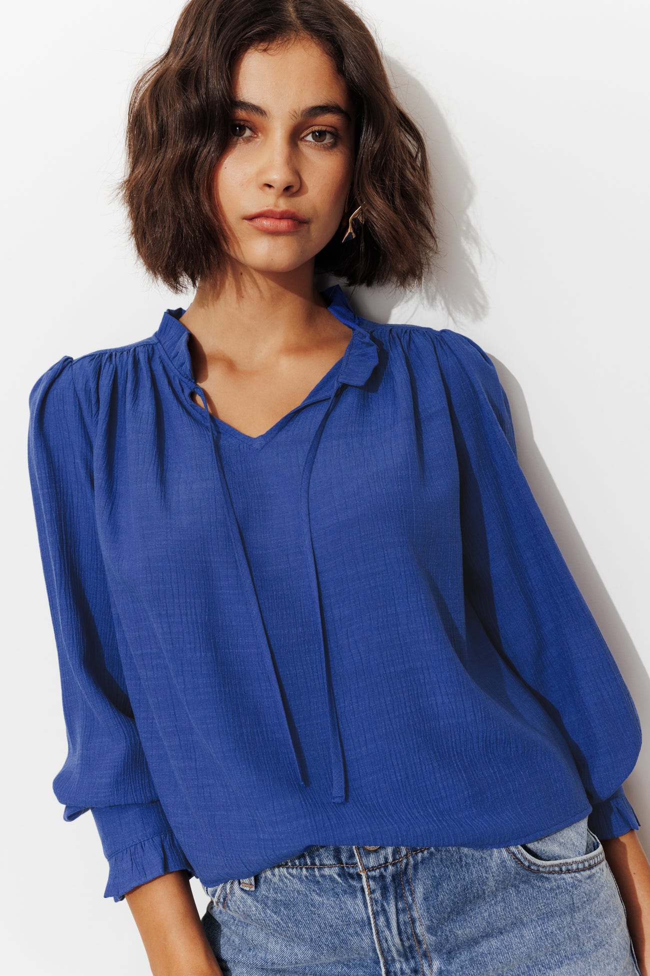 Frilly neckline blouse